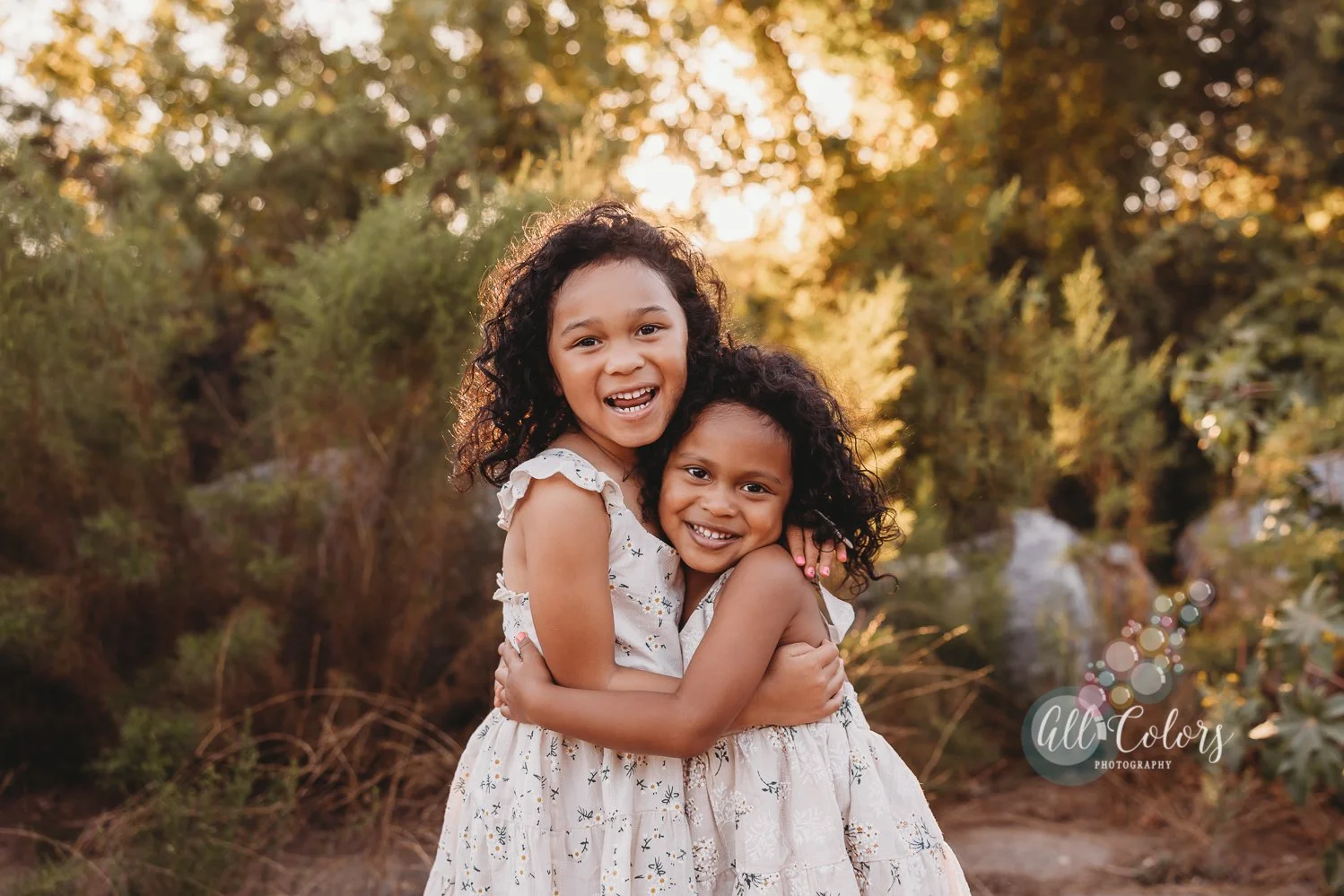 two sisters hugging each other