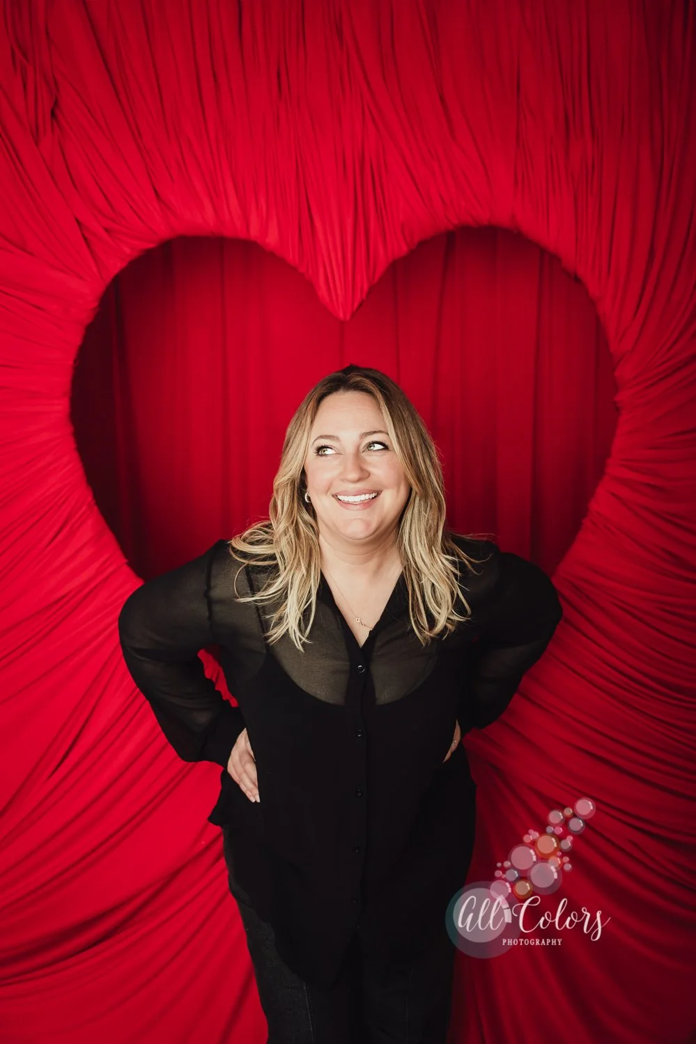red fabric draped heart backdrop for Valentine's Day