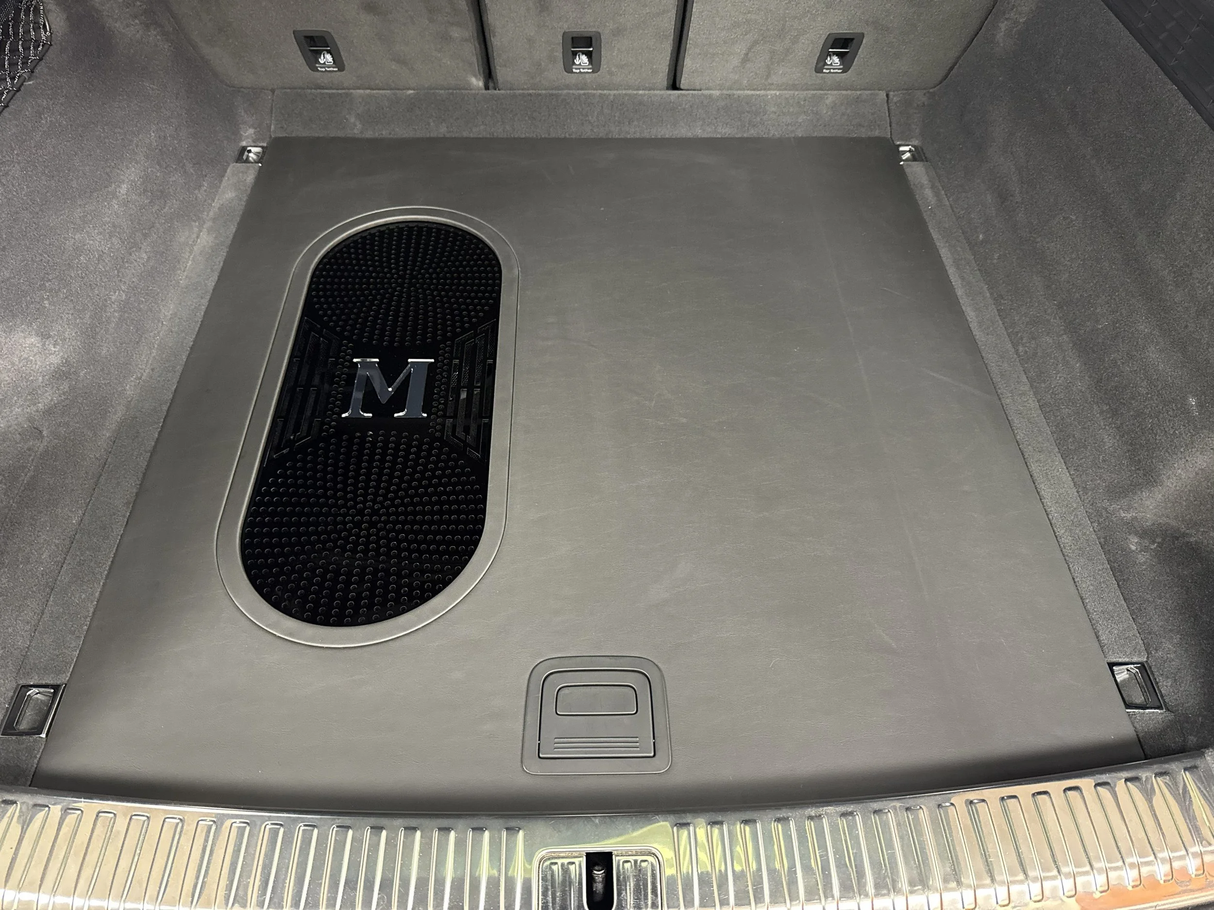 Custom CNC Laser cut grill with Logo design for a bass upgrade in a 2024 Audio RS Q8