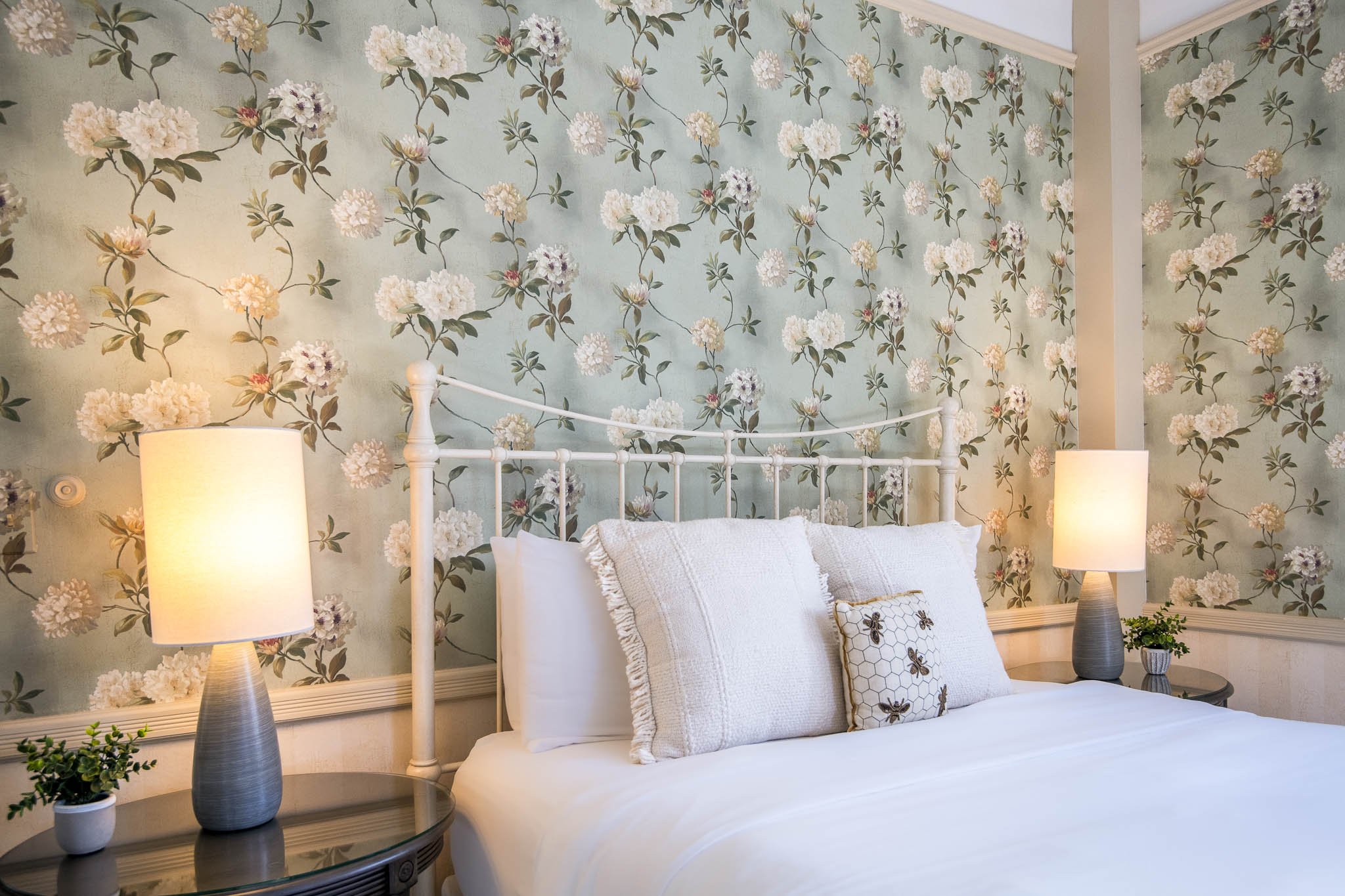 A bright and sunny corner retreat with a private balcony overlooking the gardens and Mount Desert Street, this room offers our largest bathroom with a spacious walk-in shower.