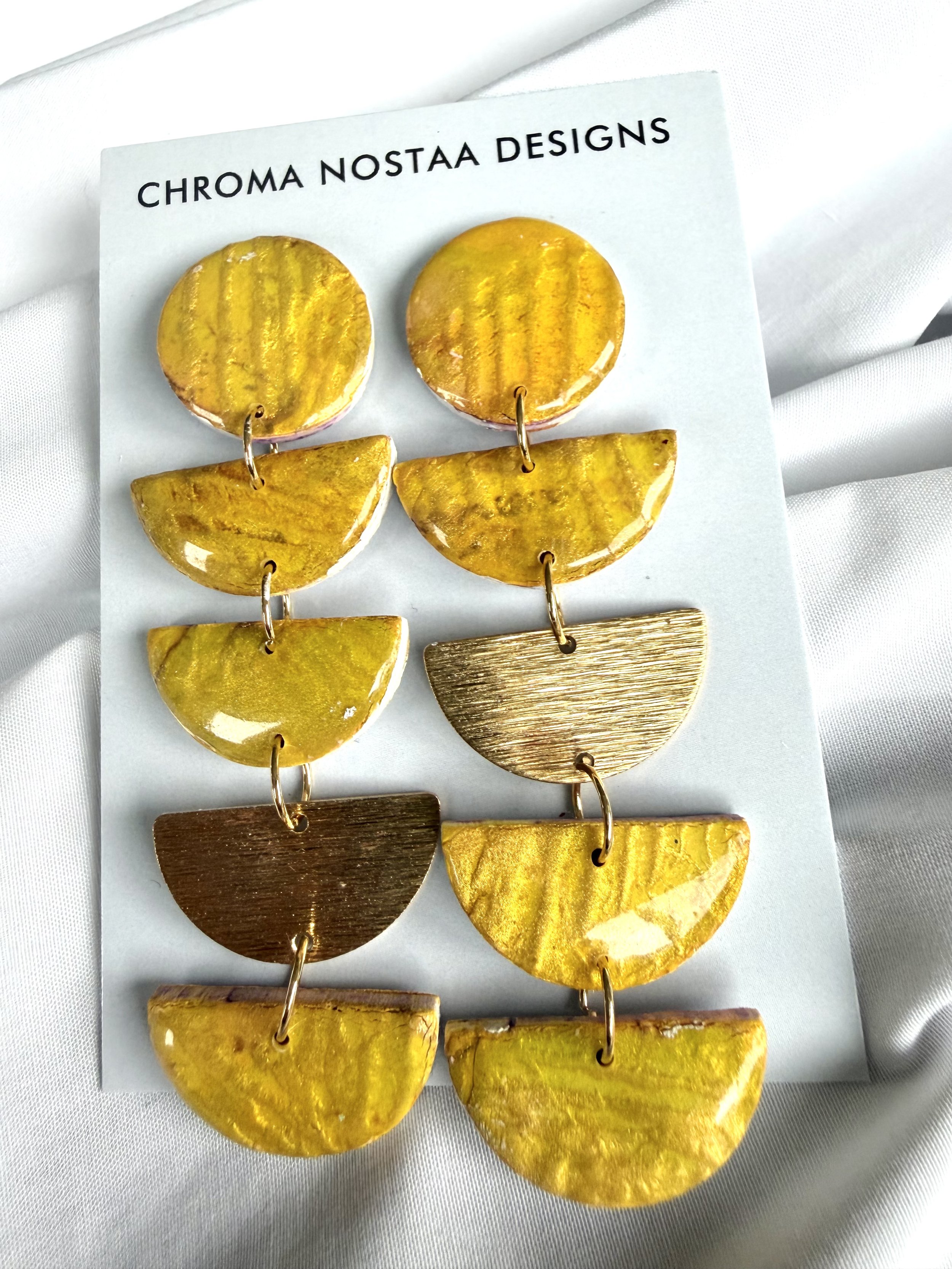 Asymmetrical Statement Dangles in Safron and Earth