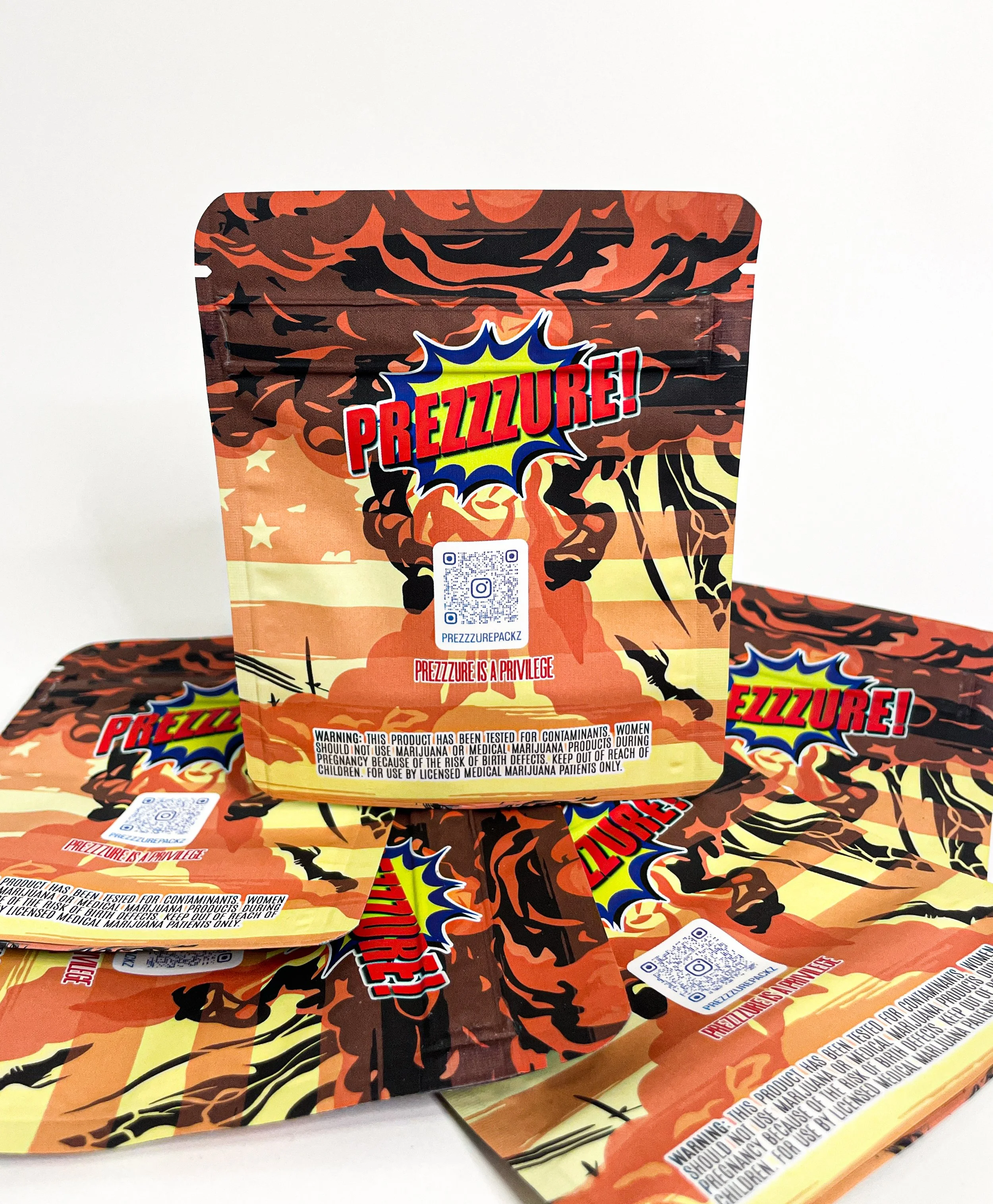 a pile of printed mylar cannabis bags with a white background