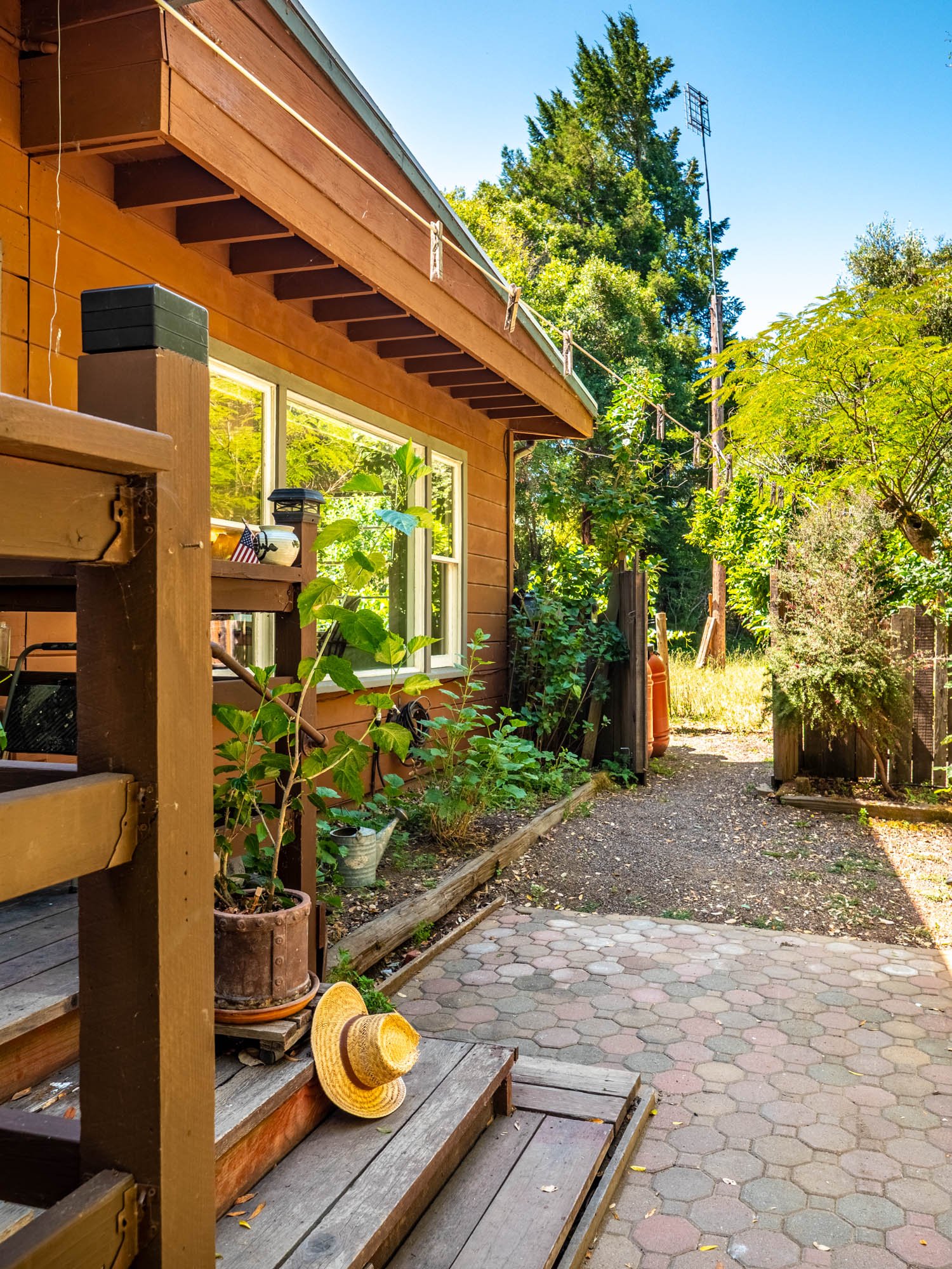 The beautiful back porch area offers a lovely patio/sitting area AND leads to the Laundry Room