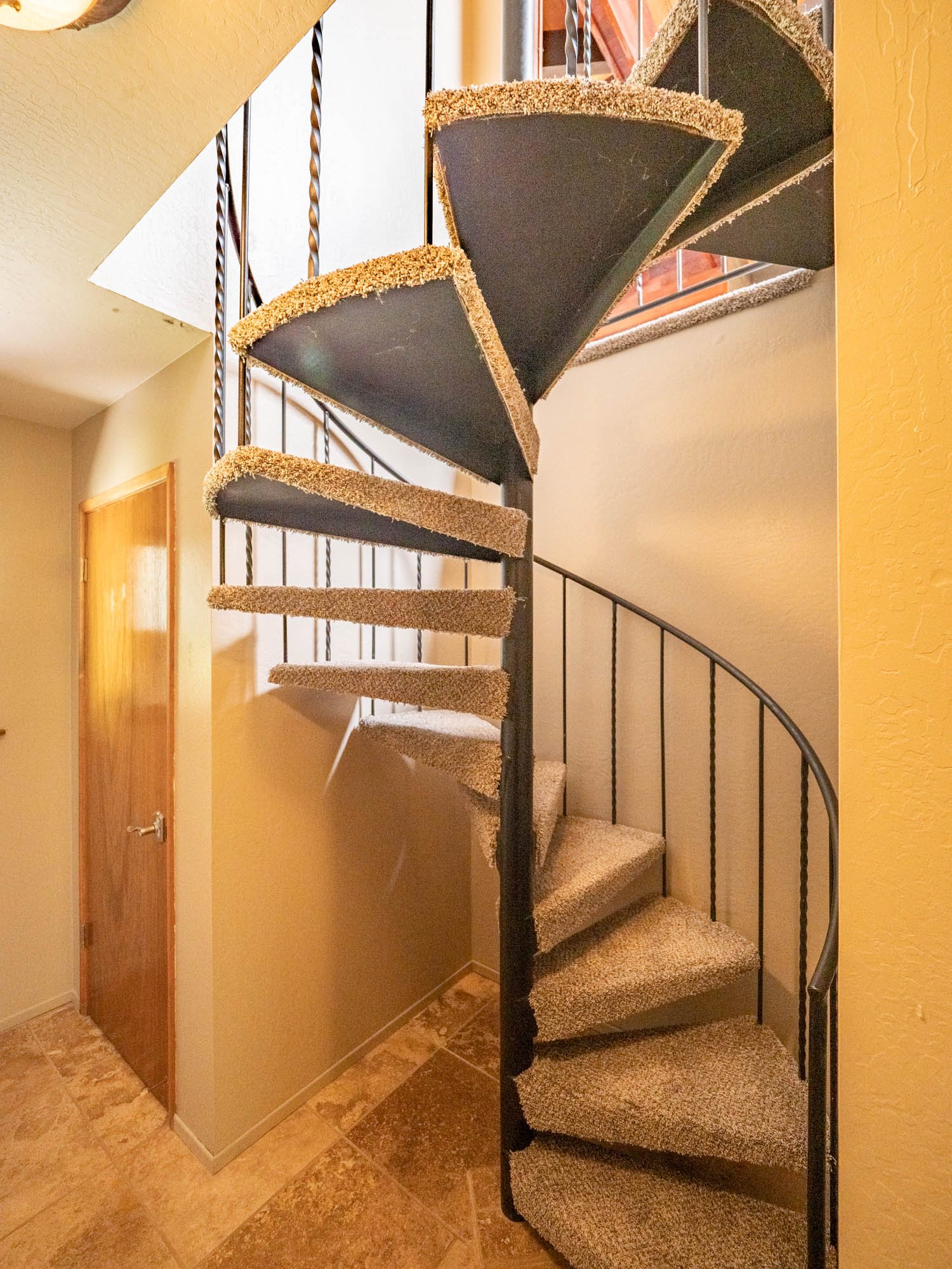 Sprial staircase leading to the lower level