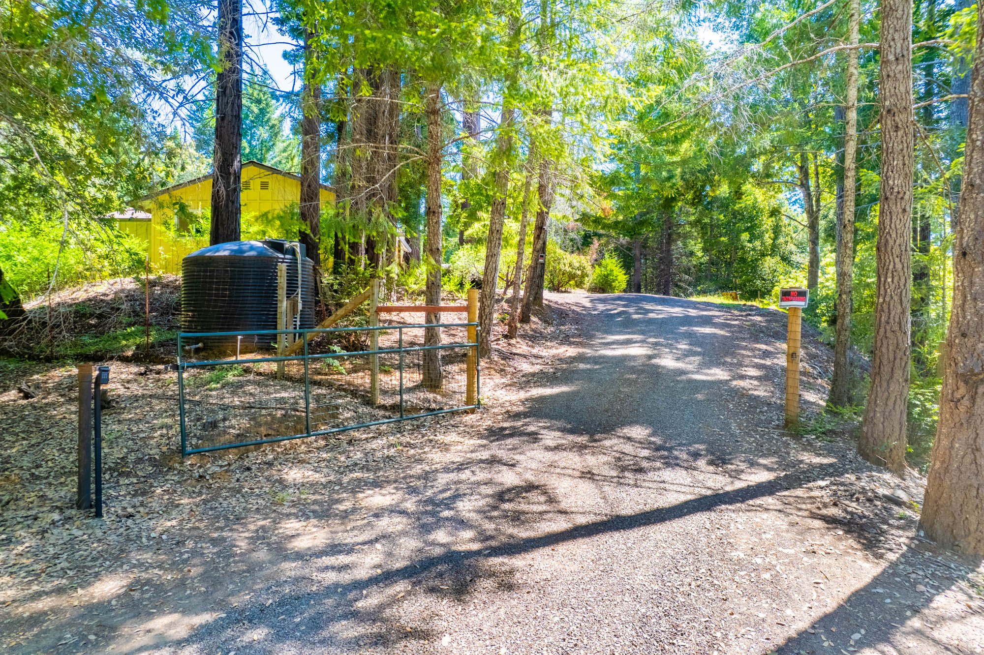 Access through a security gate. Infrastructure is in place for an electronic gate.
