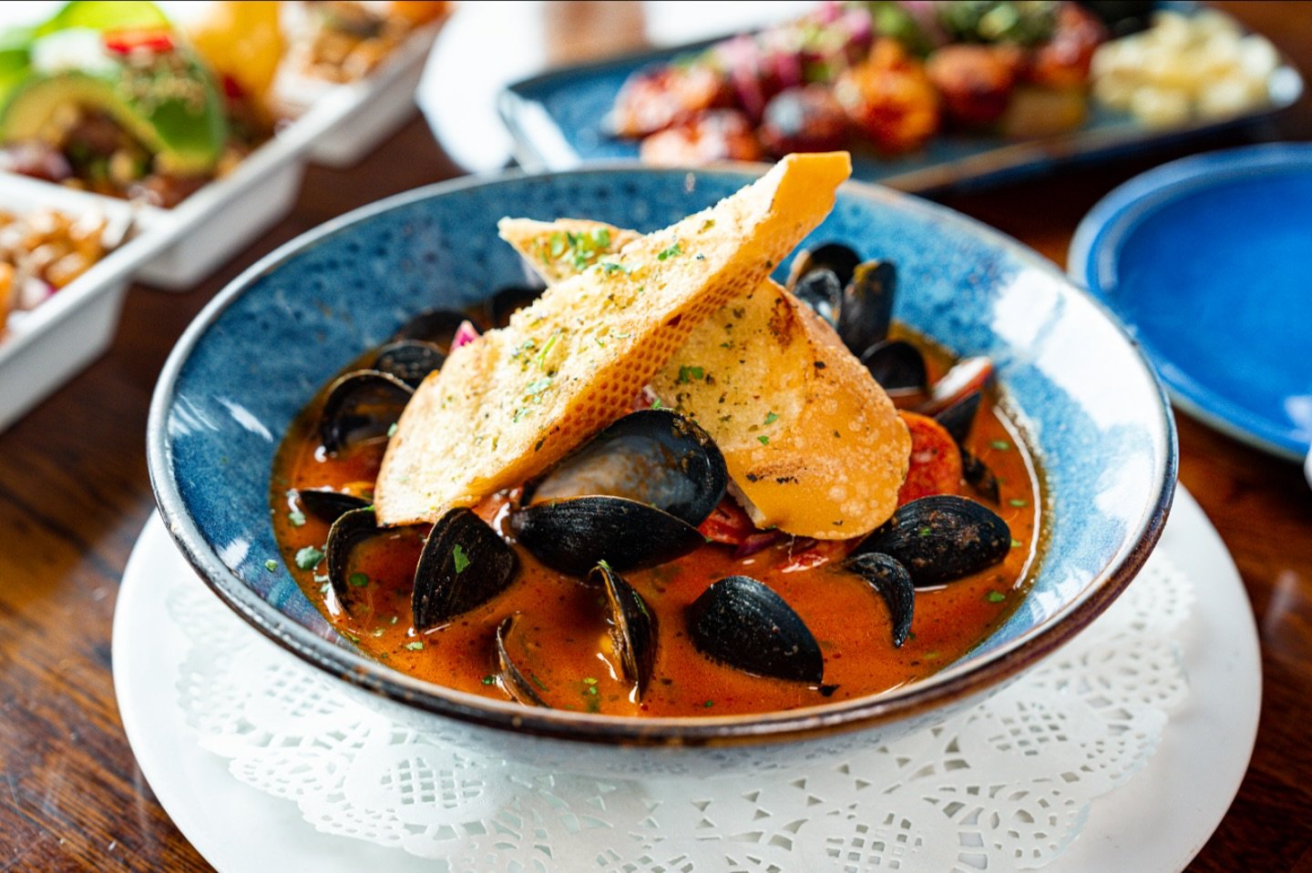 Colder days call for hearty meals&mdash;try our Parihuela! 🍲 

Seafood bouillabaisse, crab legs, fish, clams, mussels, scallops, calamari, shrimp, aj&iacute; panca, tomato, garlic bread 🦑🍤🦀 Join us!
.
.
.
#Parihuela #PeruvianCuisine #PiscoCocktai