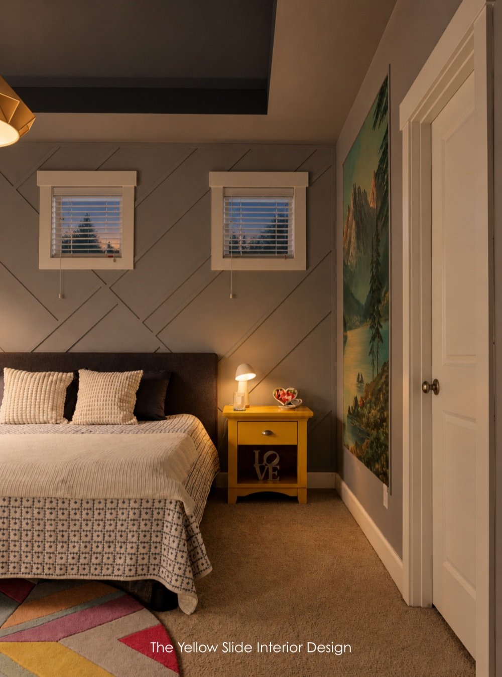 Color After Dark embraces the idea that you CAN mix and match patterns with solids, pops of color with moody and straight lines with organic shapes. The custom mural on the wall further draws the eyes up, creating the illusion of a taller ceiling.

[