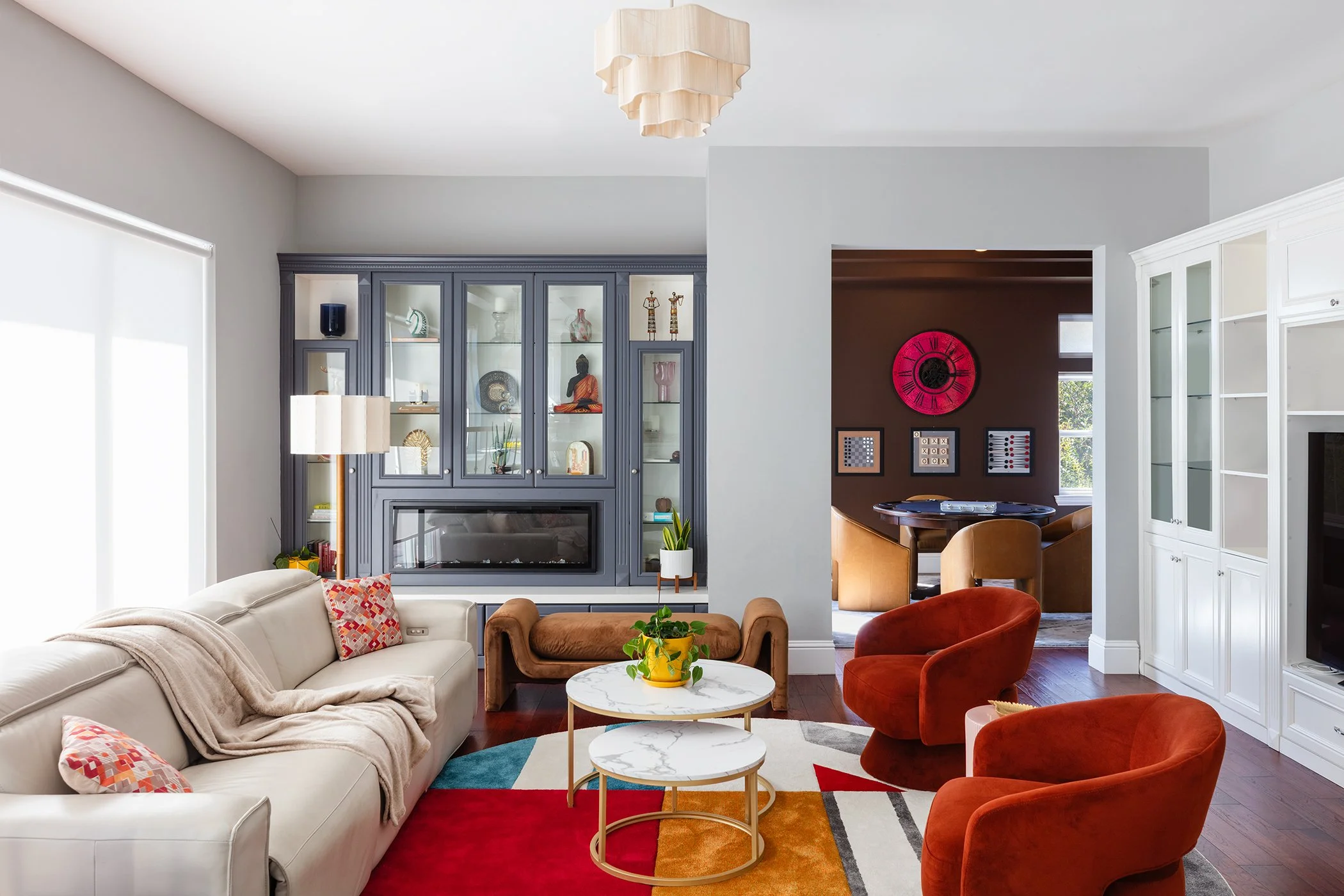 The Yellow Slide Interior Design homepage with a photo of a family room and playroom with colorful accents and built-in
