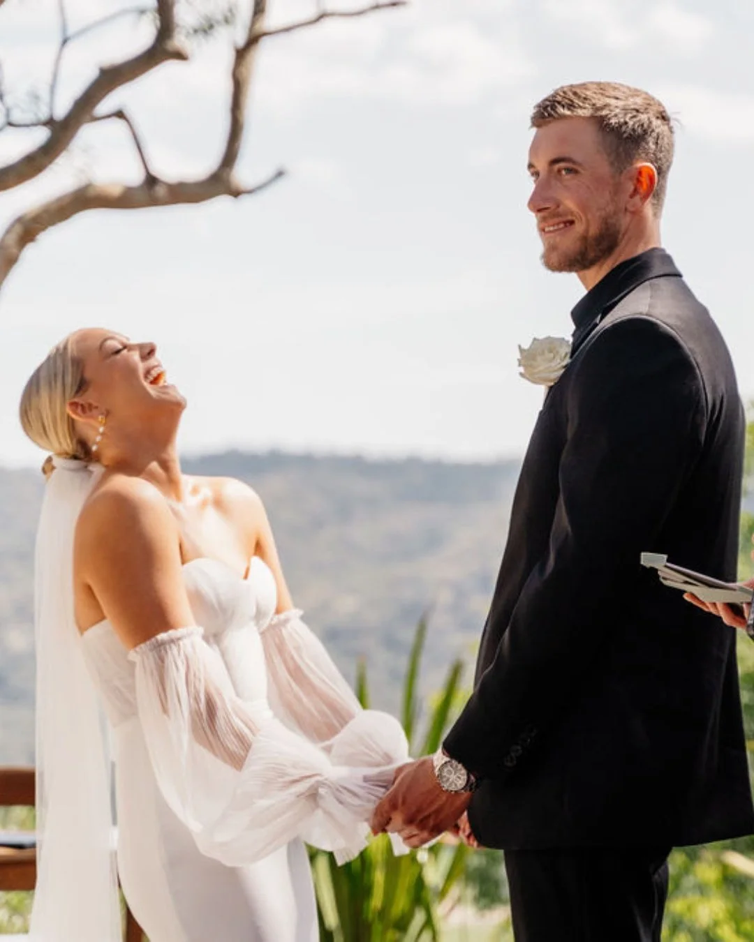 You probably wouldn't have a 'throw your head back and giggle' kind of moment with any old ordinary 'get the job done' ceremony, would you?
That's because you're not any old ordinary kind of couple, and I'm not any old ordinary kind of celebrant.

Th