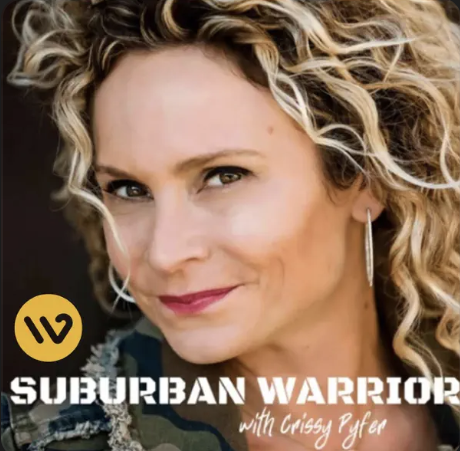 Close-up of a woman with curly blonde hair, wearing earrings, with text on the image that says 'Suburban Warrior with Crissy Pyfer' and a yellow logo in the bottom left corner.
