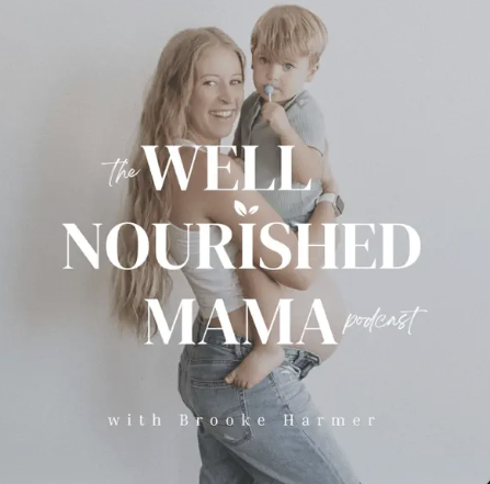 A woman with long blonde hair holding a young boy with blonde hair, smiling, against a light background, promoting 'The Well Nourished Mama' podcast with Brooke Hamer.