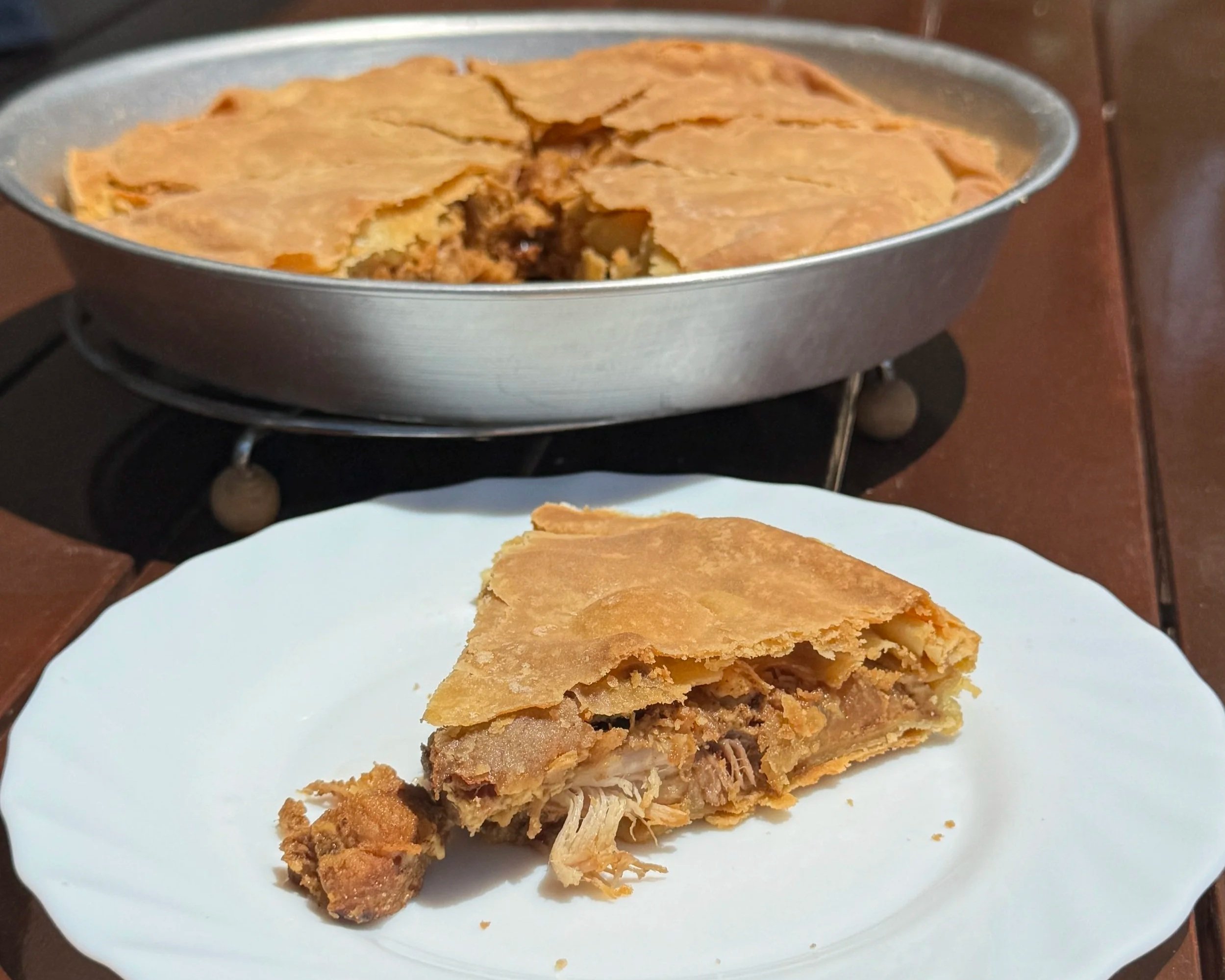 Traditional kreatopita with pork: Greek meat pie recipe