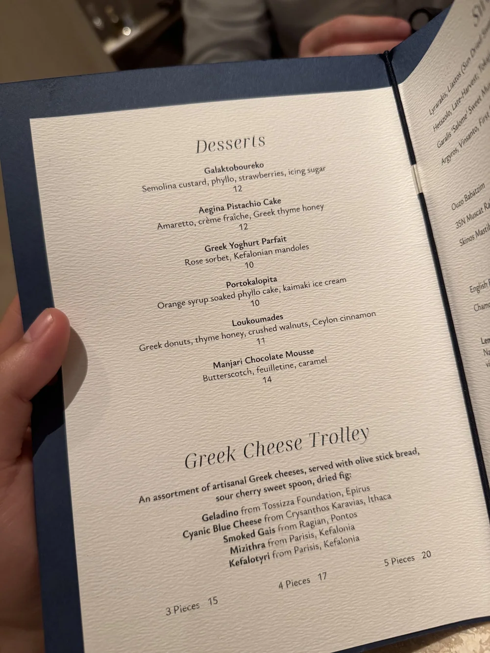 Food menu, cocktail menu, dessert menu at Myrtos by Asimakis Chelsea London Greek restaurant copyright Souvlakination