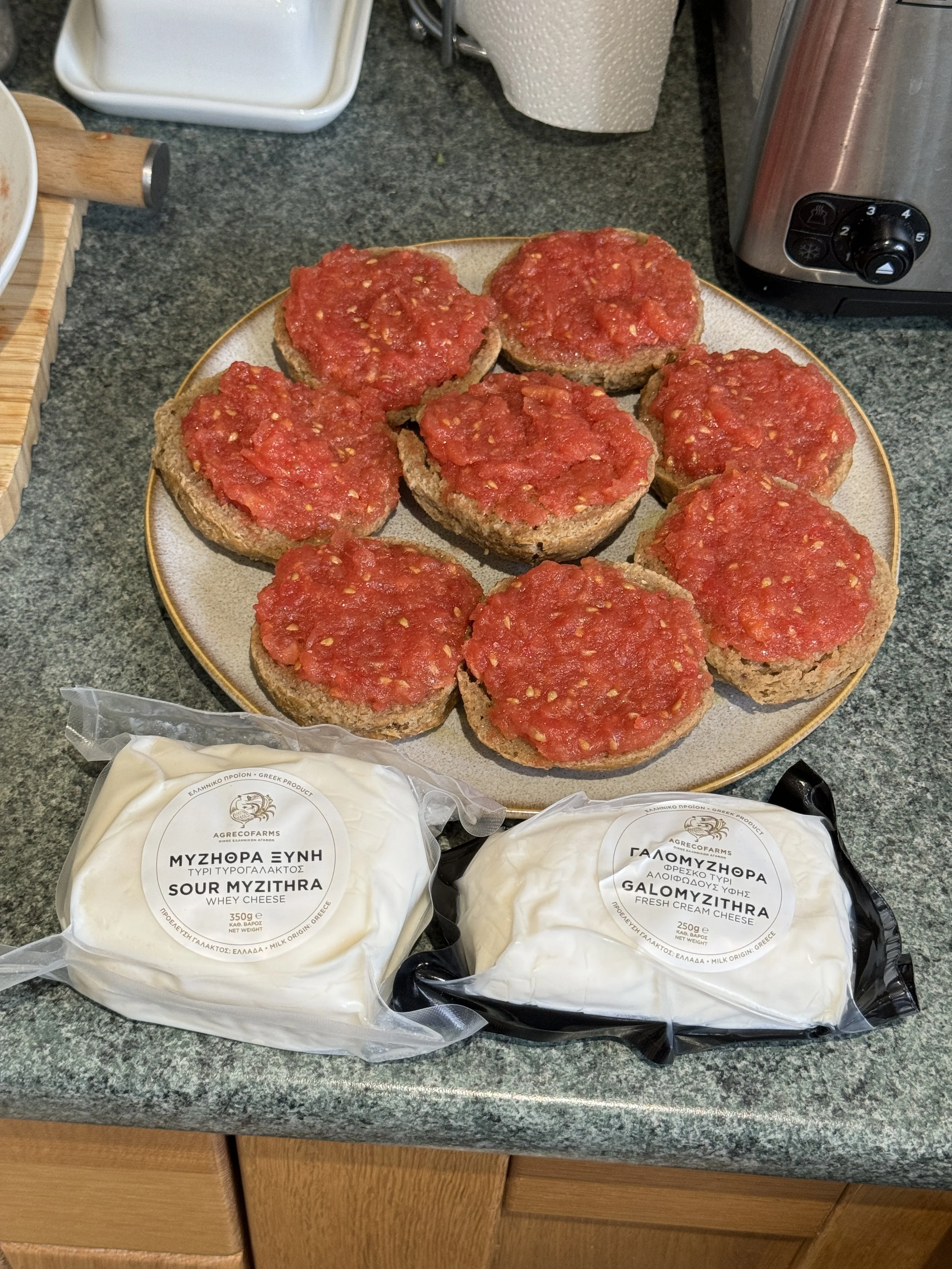 Souvlakination Cretan Dakos Recipe how to make Cretan dakos traditional Cretan barley rusk salad with xinomizithra or galomyzithra