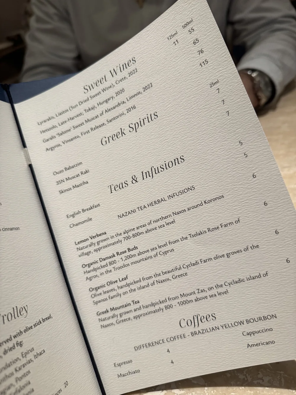 Food menu, cocktail menu, dessert menu at Myrtos by Asimakis Chelsea London Greek restaurant copyright Souvlakination