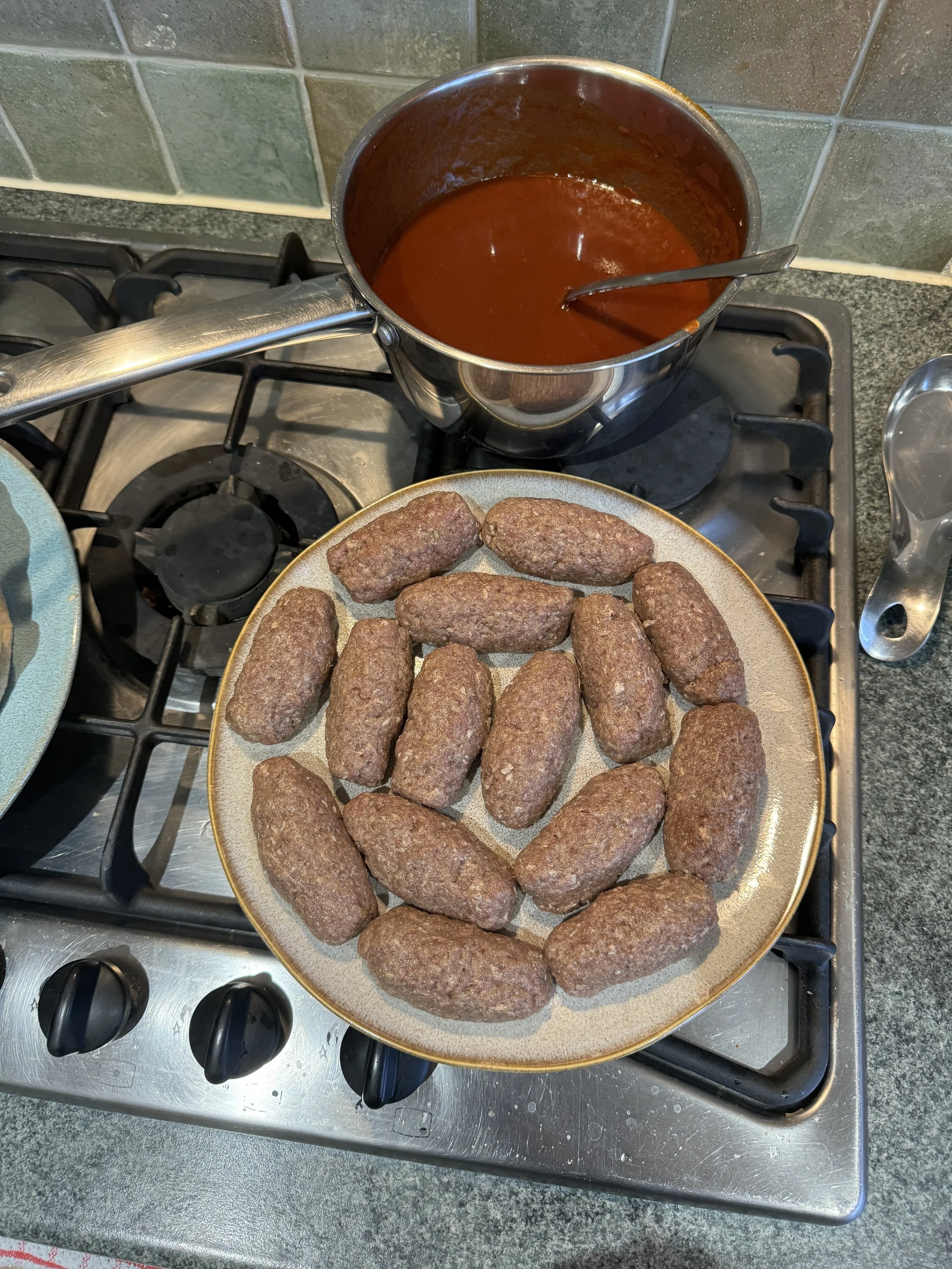 Traditional Athenian bifteki tylichto recipe with traditional homemade tomato saltsa - Souvlakination Recipes - traditional Greek food recipes