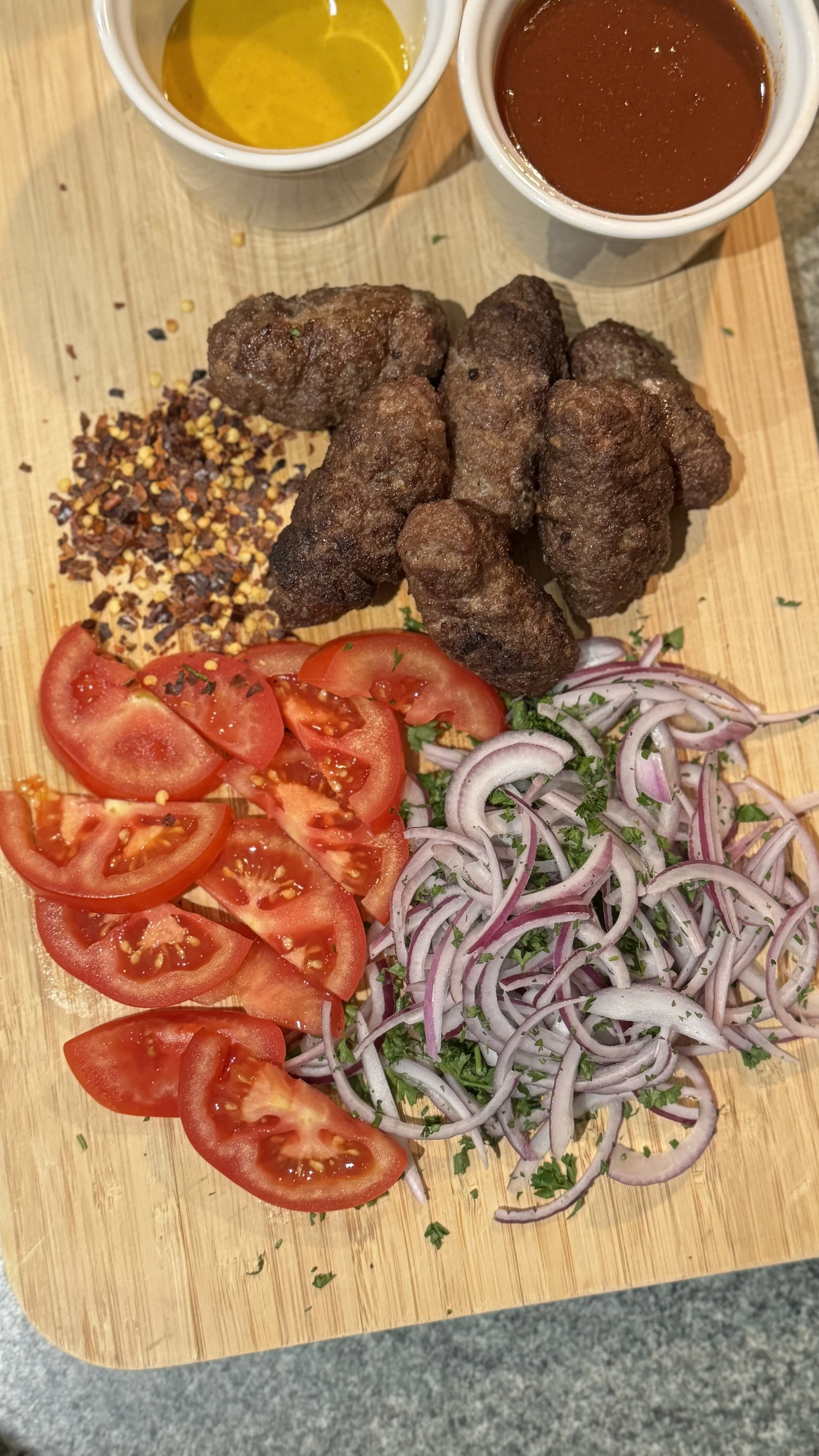Traditional Athenian bifteki tylichto recipe with traditional homemade tomato saltsa - Souvlakination Recipes - traditional Greek food recipes