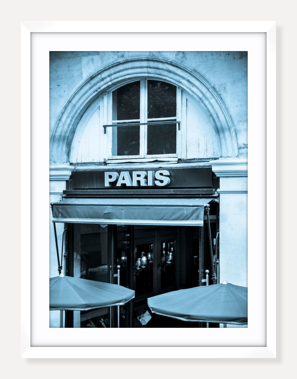 white frame Parisian cafe