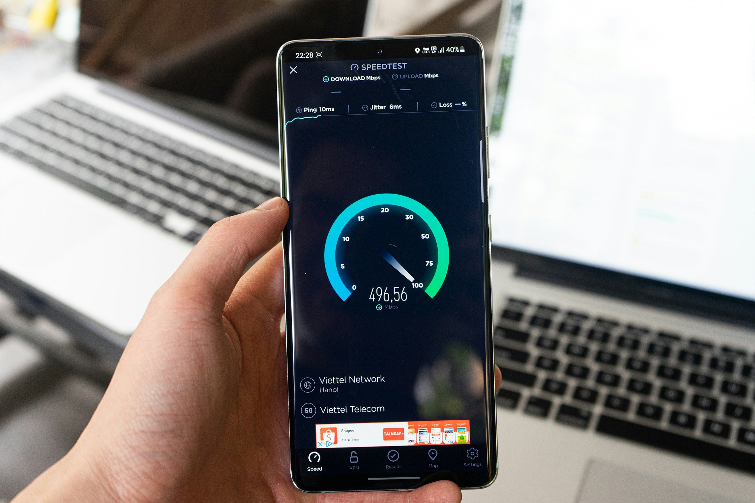 A phone running a speed test.