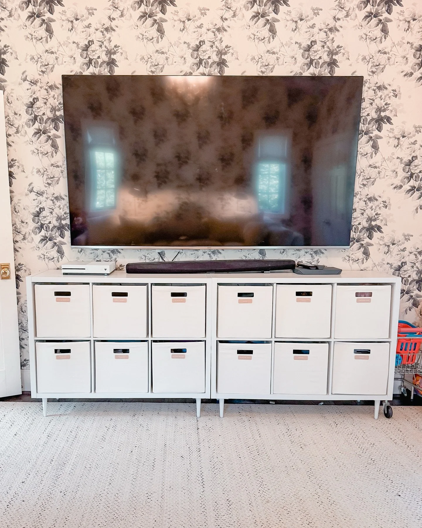 Double duty playroom: where big girls hang out and little ones play! 

This space needed to work for older girls and the youngest who loves American Girl dolls. Costumes went from crammed in drawers to neatly hung-- perfect for those themed school dr