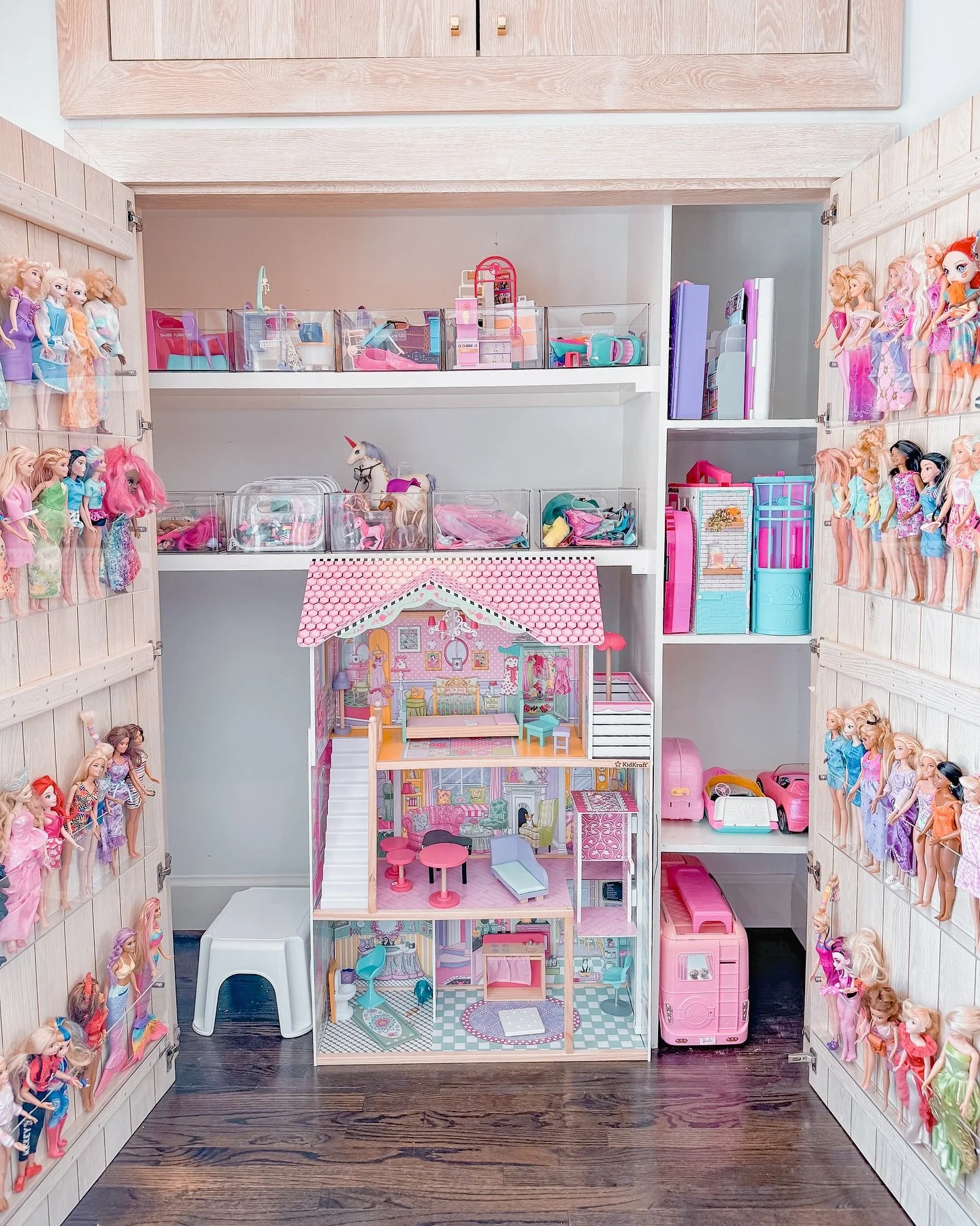 The ultimate Barbie dream closet! 💗✨

This closet holds it ALL&mdash; the playhouse, clothes, shoes, furniture, cars, and every tiny accessory! We maximized every inch by adding acrylic magazine racks to the doors, turning them into the perfect Barb