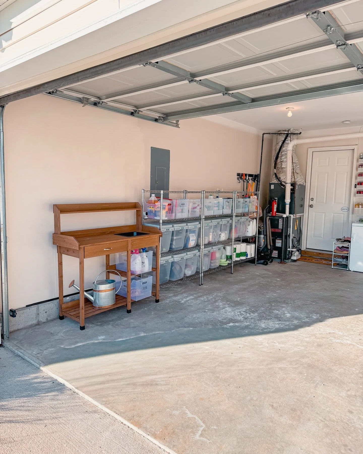 Garage transformation: from floor chaos to functional paradise! 🏠✨

We added shelving to get everything off the ground, bins with lids for long-term storage, and open bins for easy access to essentials. A wall-mounted rack hold drink backstock, a de