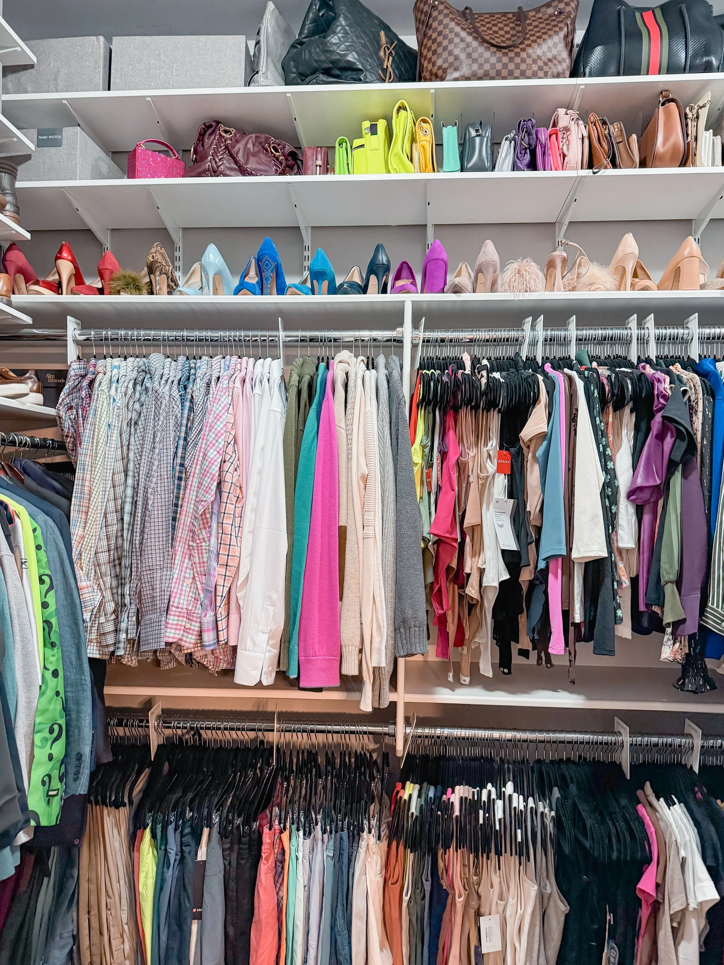This primary closet had all the ingredients for chaos: a shared space, two very different wardrobes, mismatched hangers, and nowhere intentional for shoes or bags to live. Everything just landed wherever it fit making it feel harder than it should to