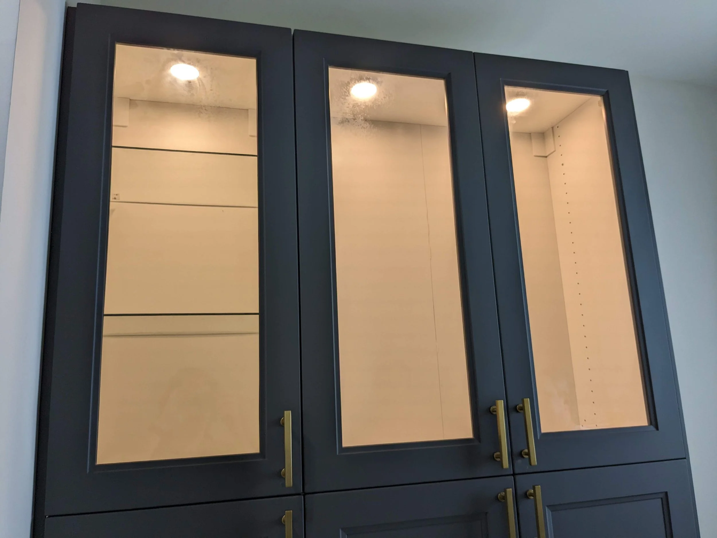 Custom Cabinet Installation with Glass Display Doors – Tampa, FL