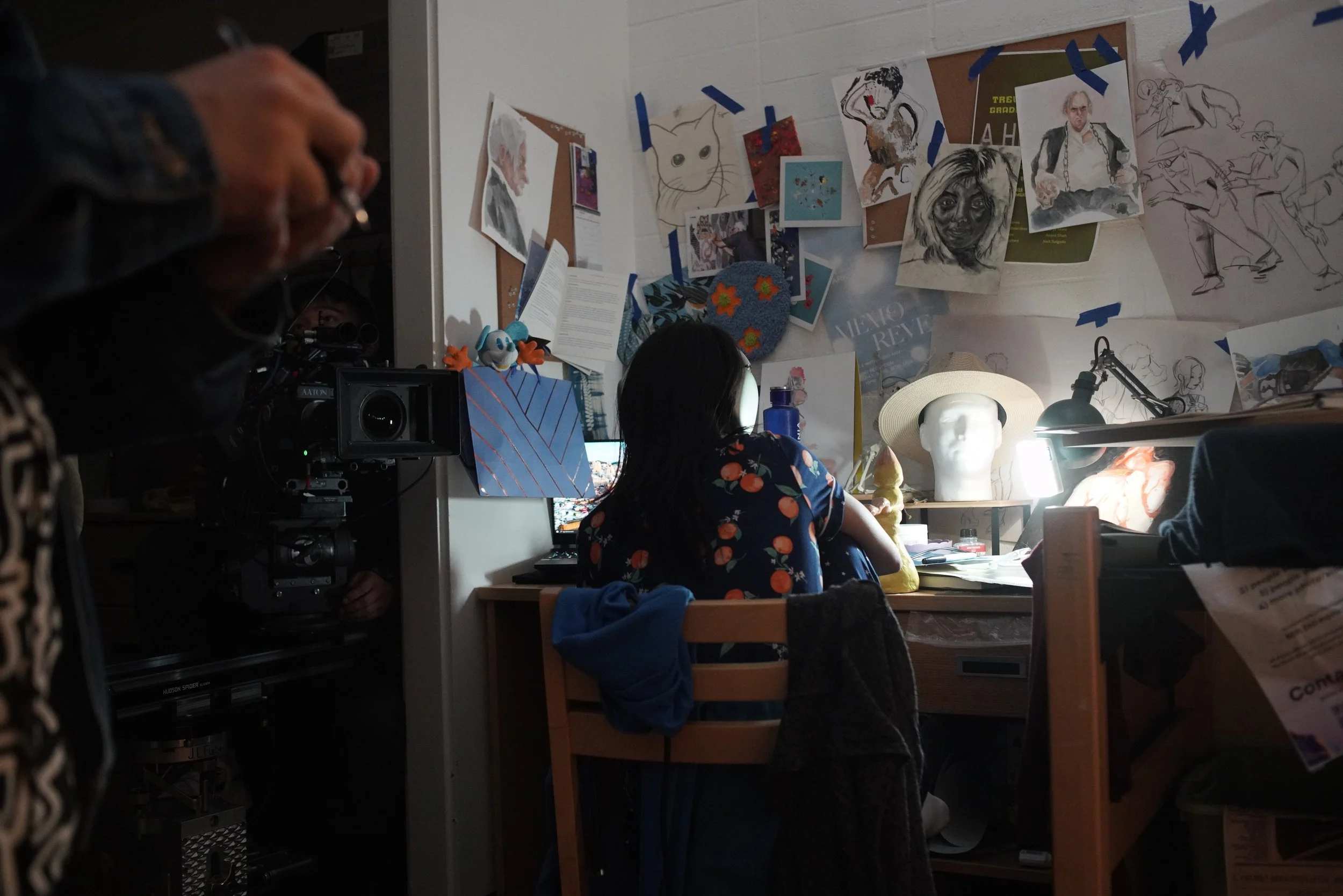 “Tile of Blue Wall” shot on 16mm film, this independent experimental work follows Eva, a photography student who begins to notice strange, recurring symbols appearing on the footage she develops. What starts as a technical curiosity soon unfolds into