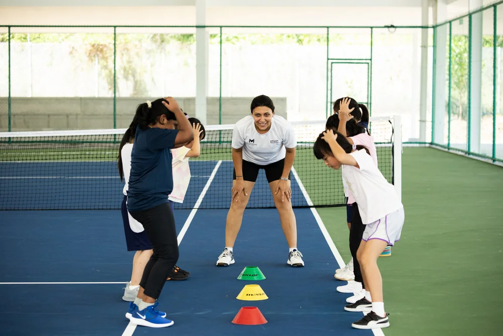 Beginner junior tennis camp fun and friendly environment