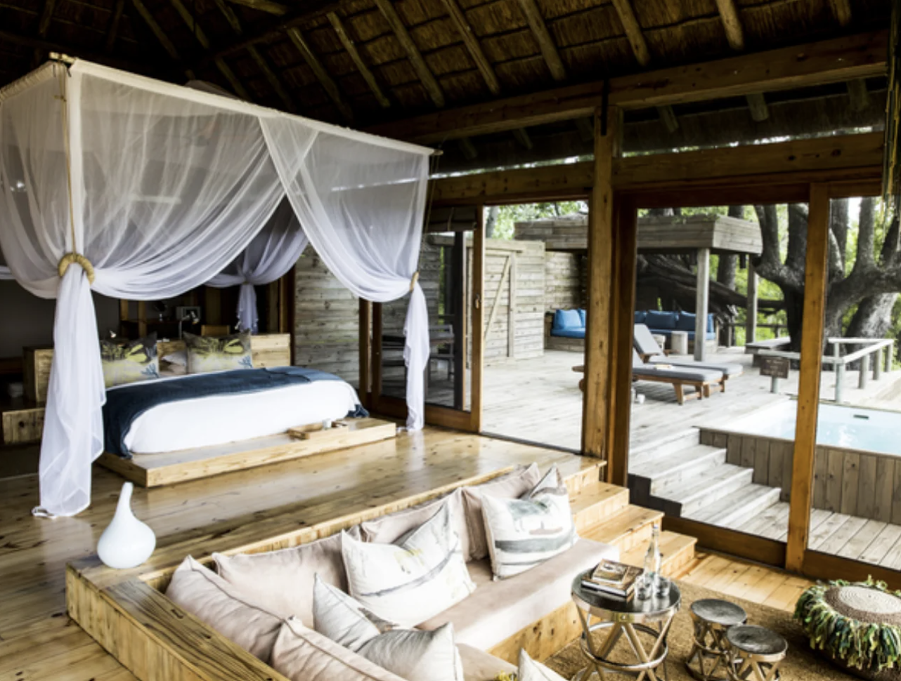 luxury accommodation with mosquito netting on Pan Am luxury private jet safari