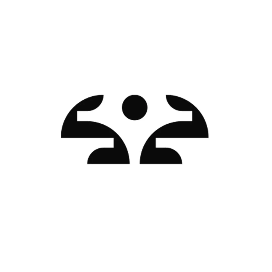 Abstract black and white logo with symmetrical shapes and a central circle. That was featured in logo lounge book 15