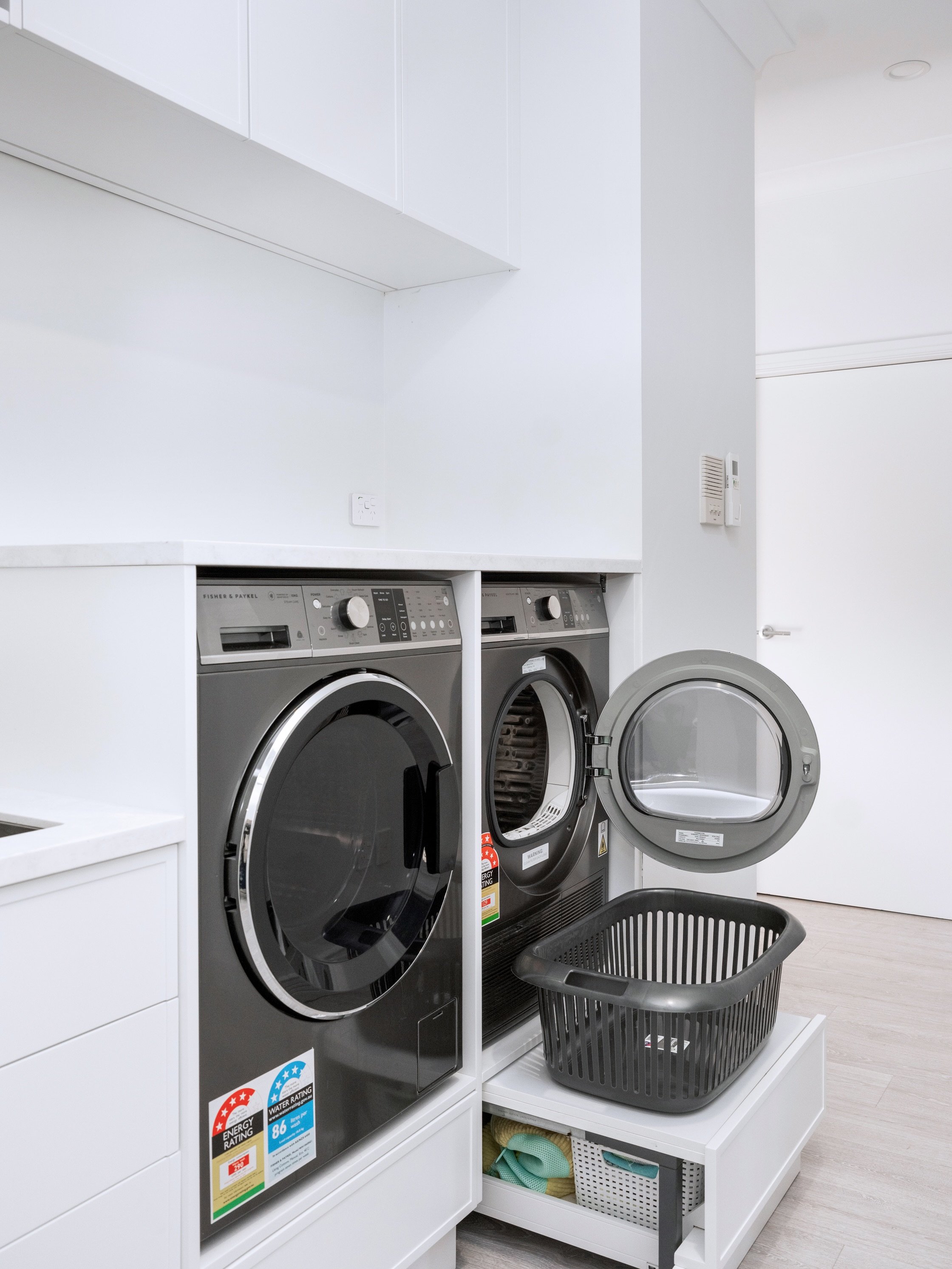 This laundry has a step-up drawer. Literally 🧺

All white, all considered - the space-step drawer tucks under the washer and dryer for extra storage, and doubles as a step-up to reach the bench and overhead cabinetry.

✨ Space-step drawer from @blum