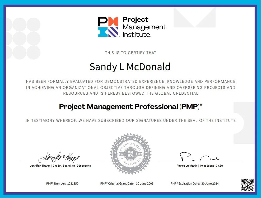 Certificate from the Project Management Institute awarded to Sandy L McDonald for achieving PMP certification, signed by Jennifer Tharp and Pierre Le Manh.