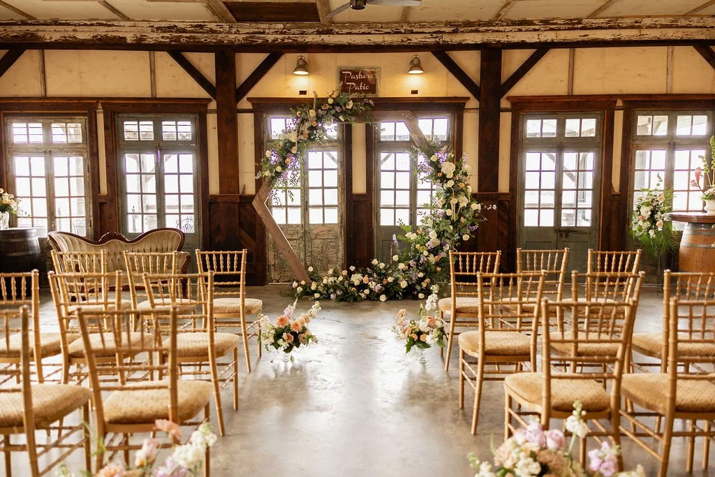 rustic indoor wedding ceremony flowers from buck naked farm in pittsboro, nc