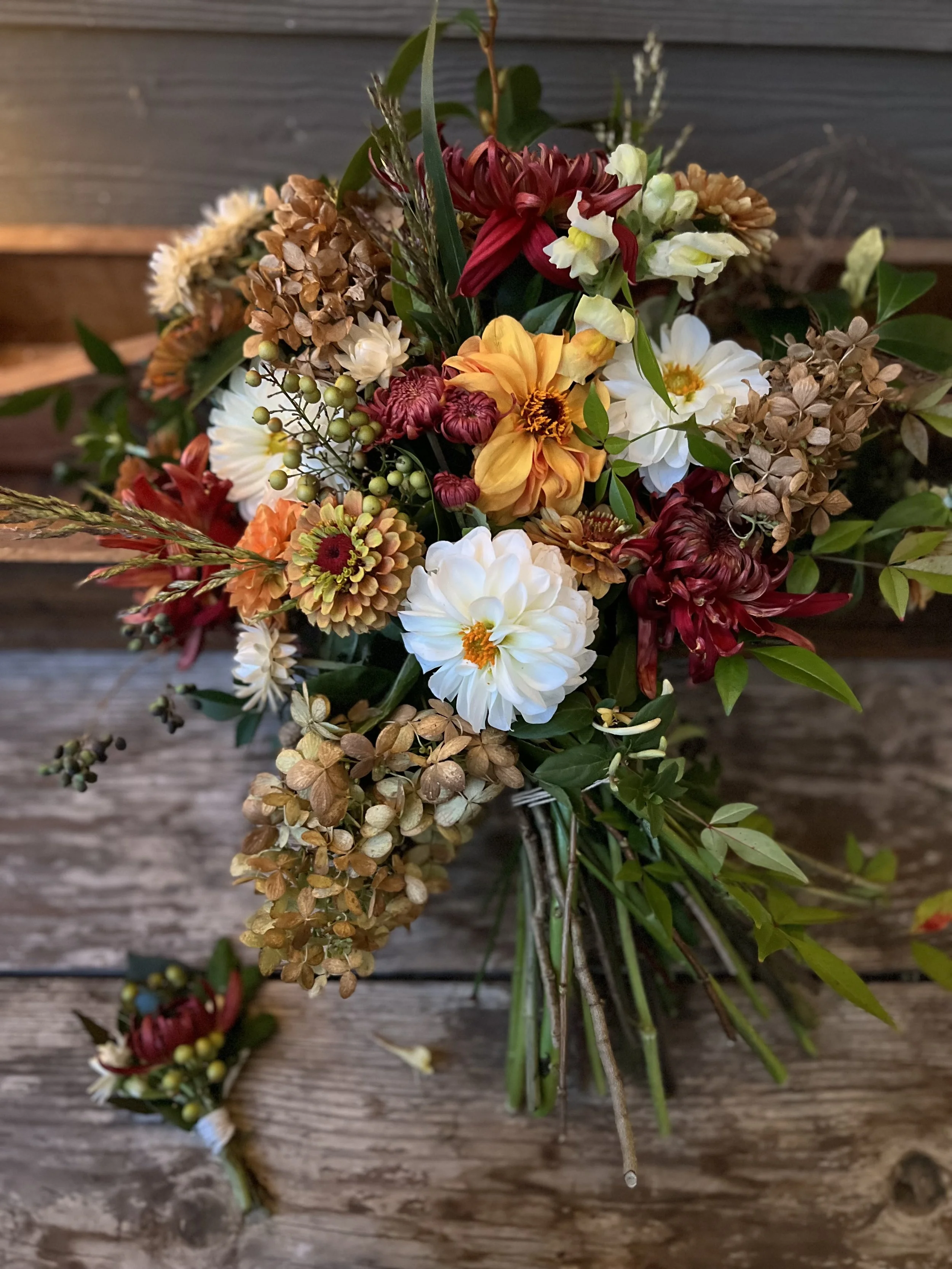 Crimson and gold fall bridal bouquet in Cary, NC