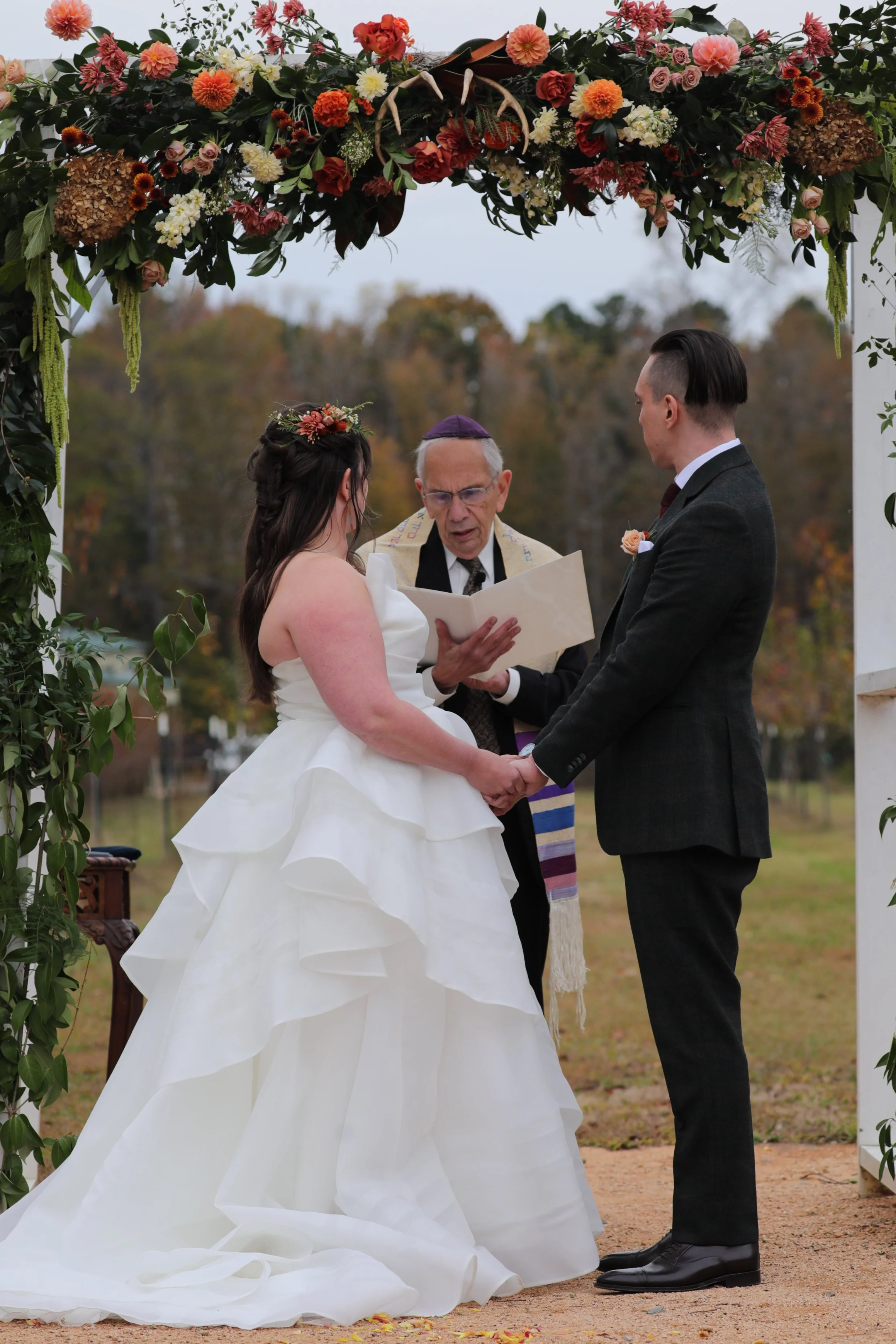 Woodland fall wedding arbor at The Honeysuckle Tea House in Chapel Hill, NC