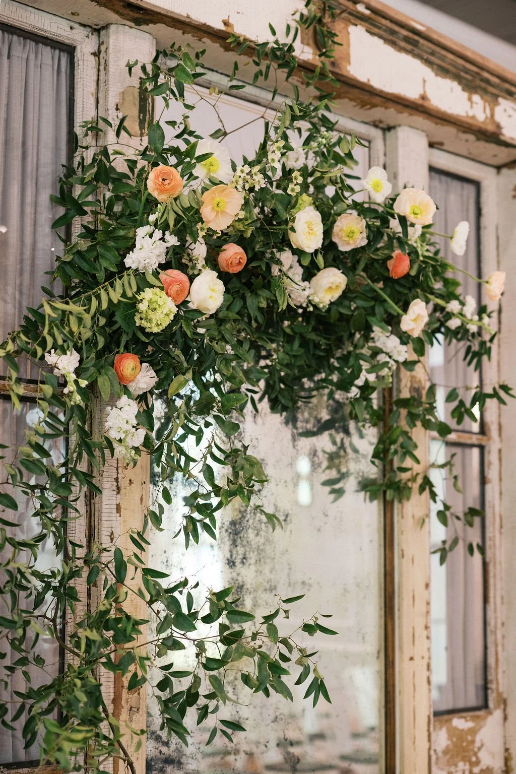 Wedding flower arch Parlour at Manns Chapel.jpg