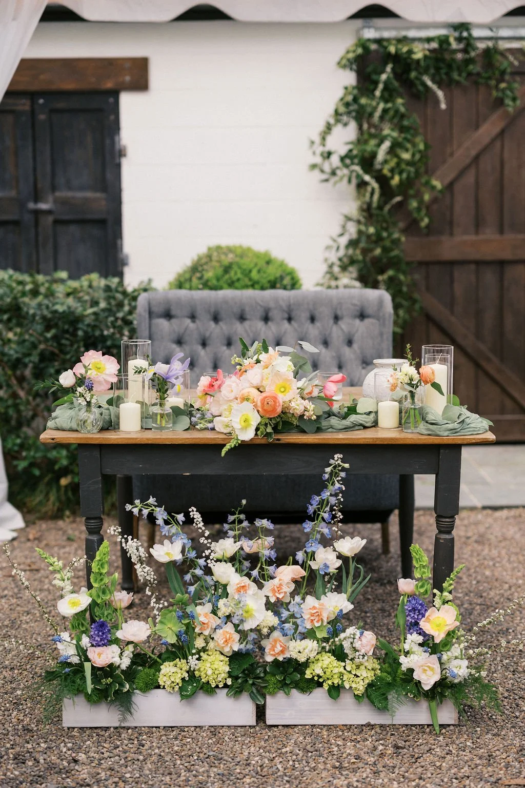 Spring meadow boxes at wedding sweetheart table in Chapel Hill NC