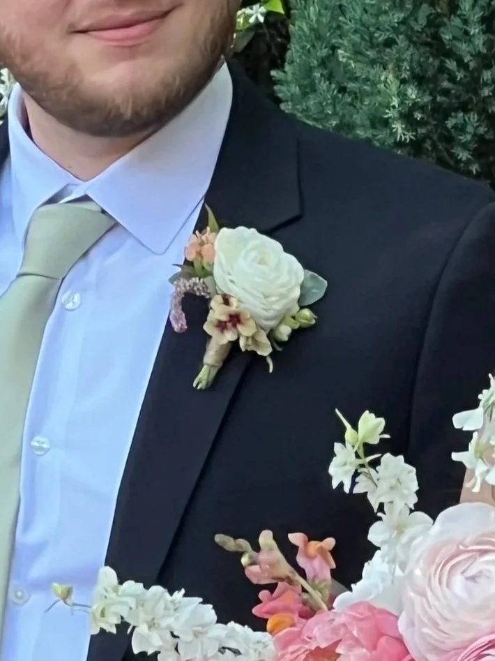 White spring groom boutonniere at the Cookery, Durham, NC