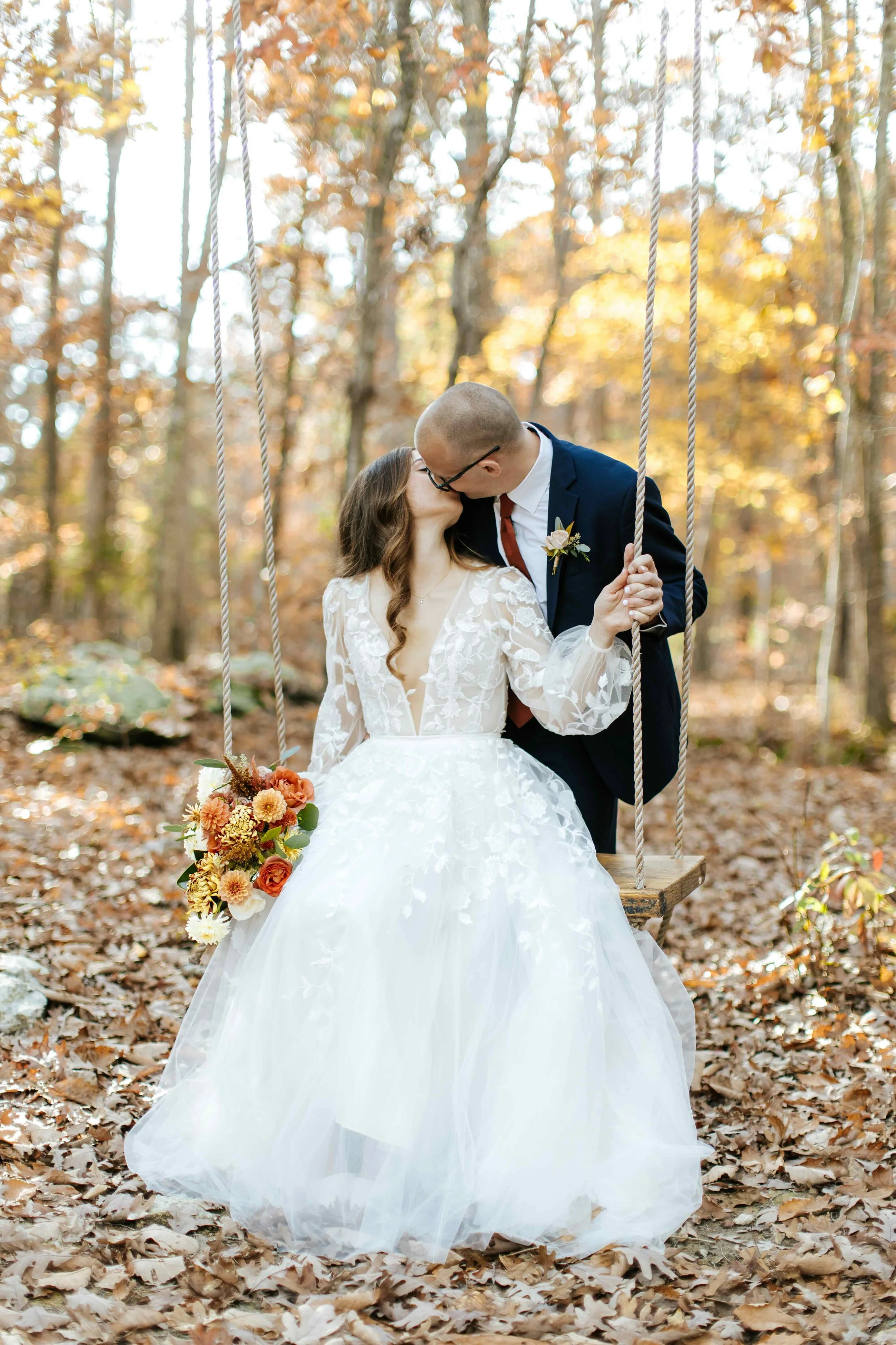wedding couple on swing in Chapel Hill, NC