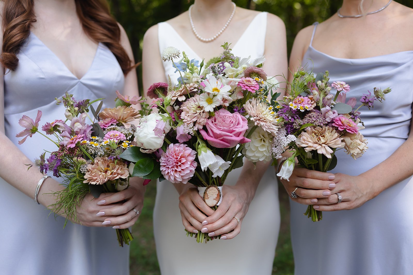 Pink garden style wedding bouquets at The Barn at Valhalla