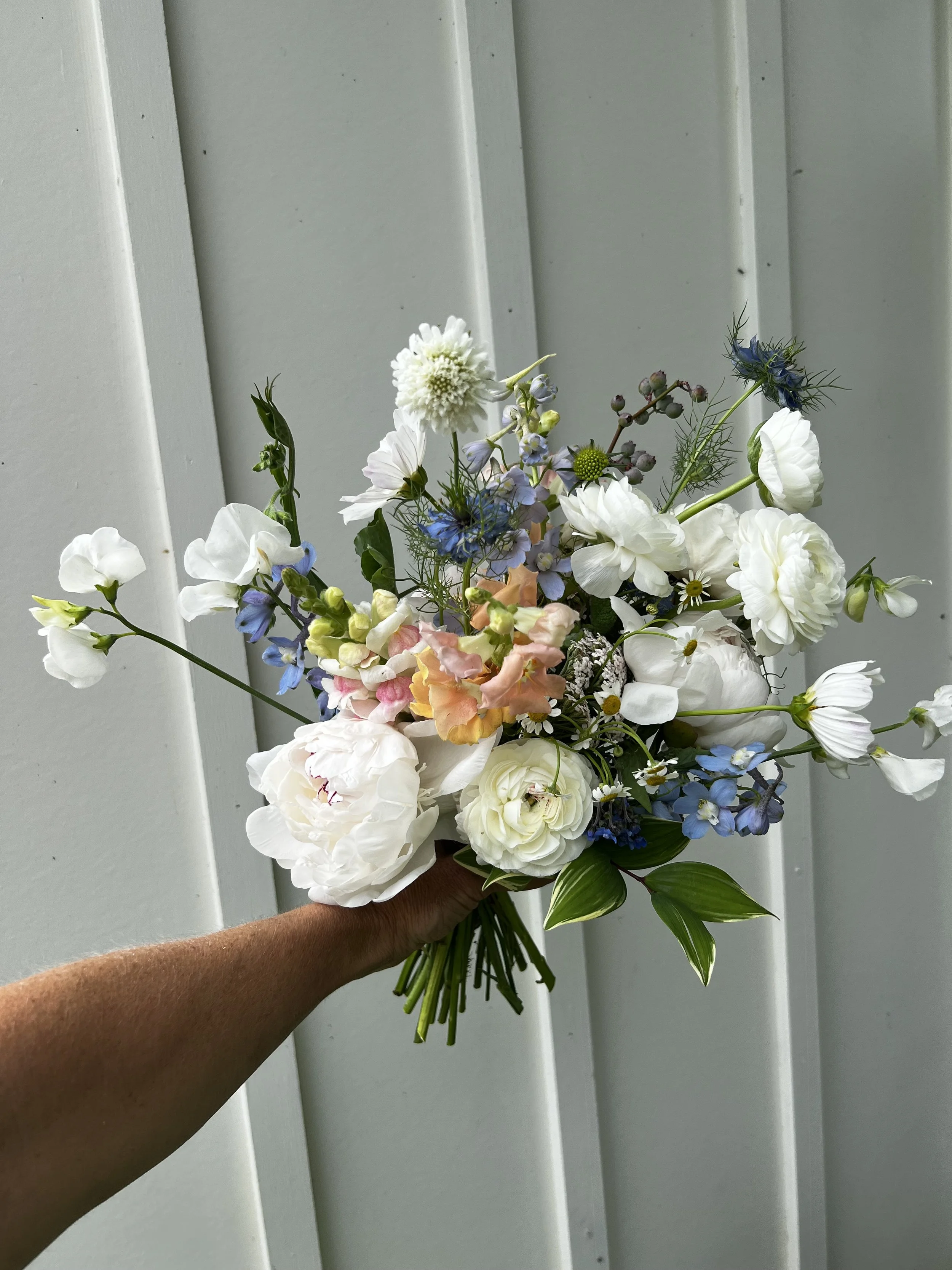 Peach and pink bridal bouquet for a spring microwedding