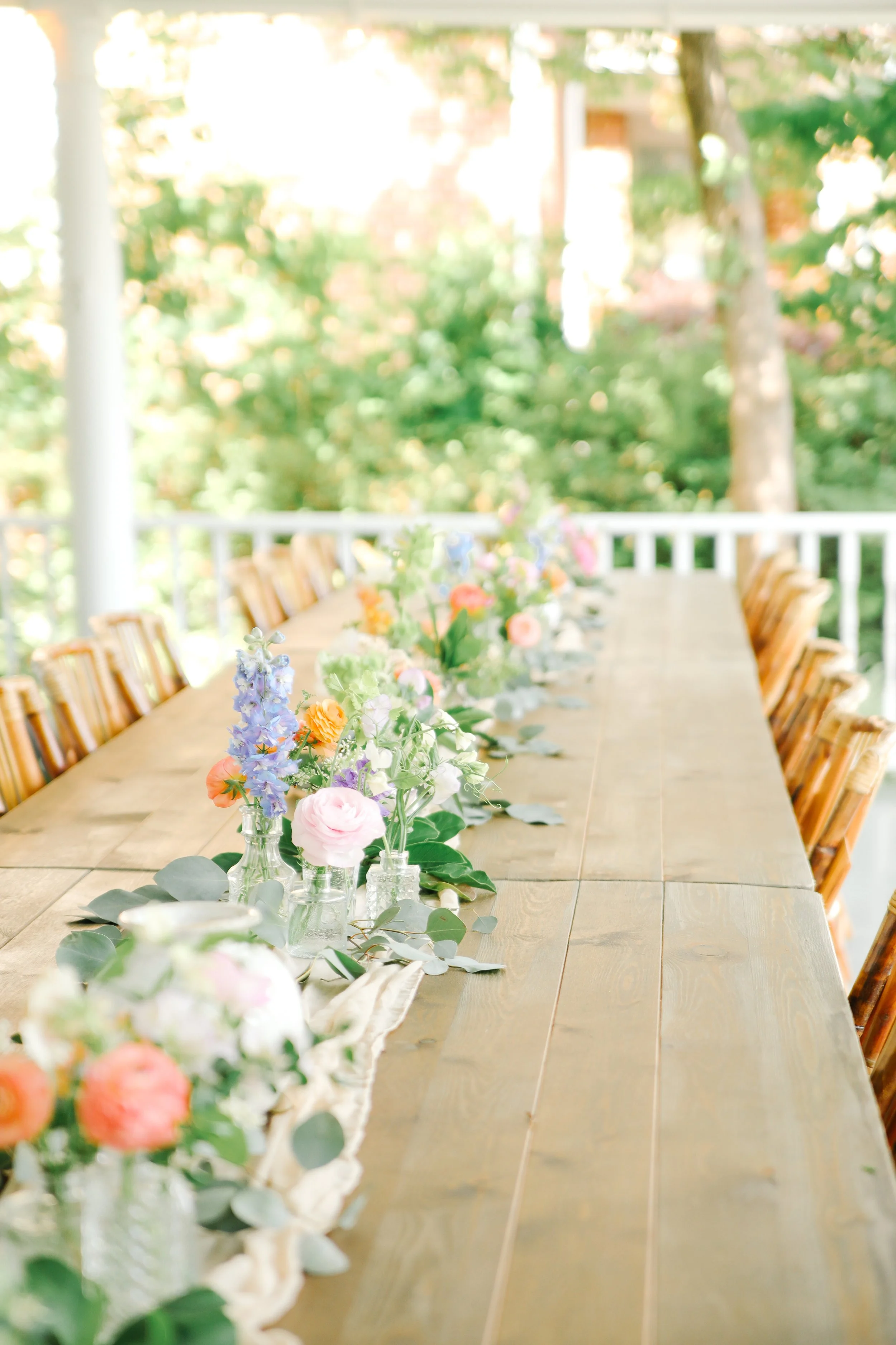 Pastel spring bud vases at a microwedding in Pittsboro, NC