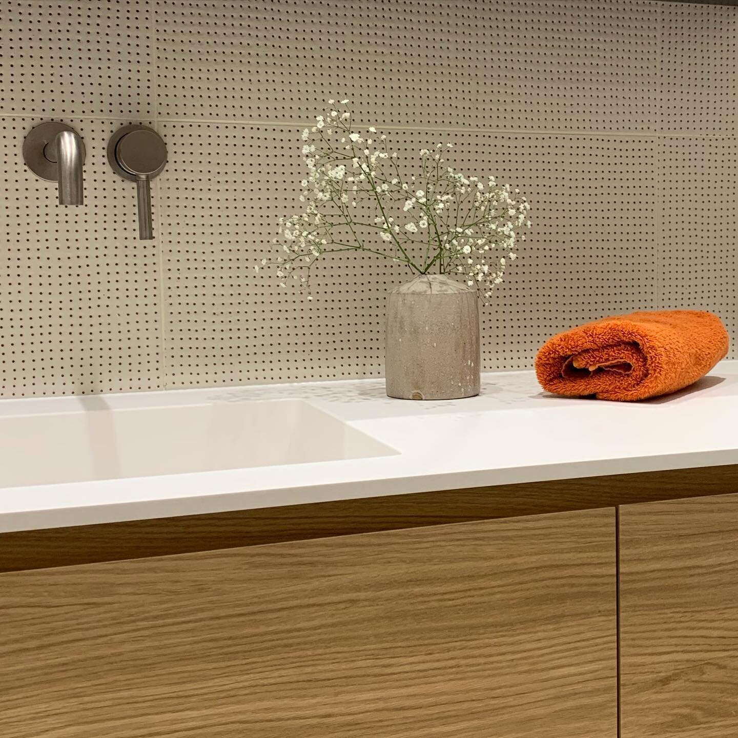 These lovely tiles really warmed up a contemporary bathroom in this recent project. We love to introduce more colour to bathrooms by using coloured towels. These burnt orange ones fit the bill perfectly. #interiordesign #bathroomdesign #tiles #interi