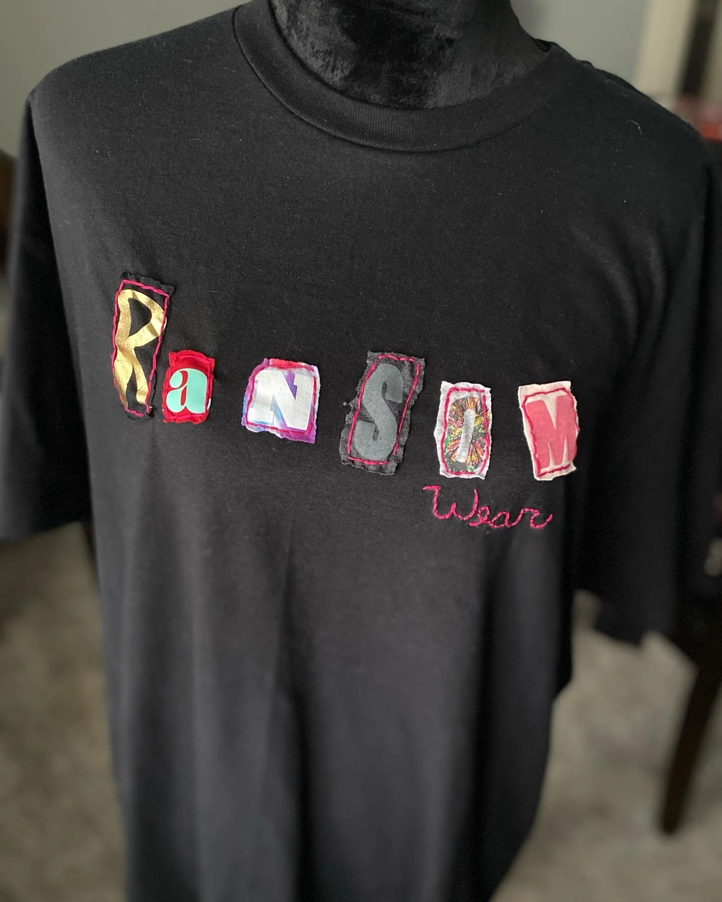 One of my favorite things to make are these Ransom Wear shirts. 

I take letters from secondhand items to create one-of-a-kind logo tees. Each one is hand embroidered, and includes a Ransom Wear label! 

I mostly do L and XL sizing, but can accommoda