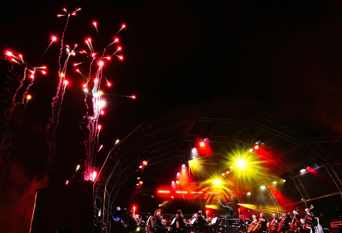 Enyi Okpara, conducting the Bournemouth Symphony Orchestra to a firework display at Meyrick Park in August 2025.