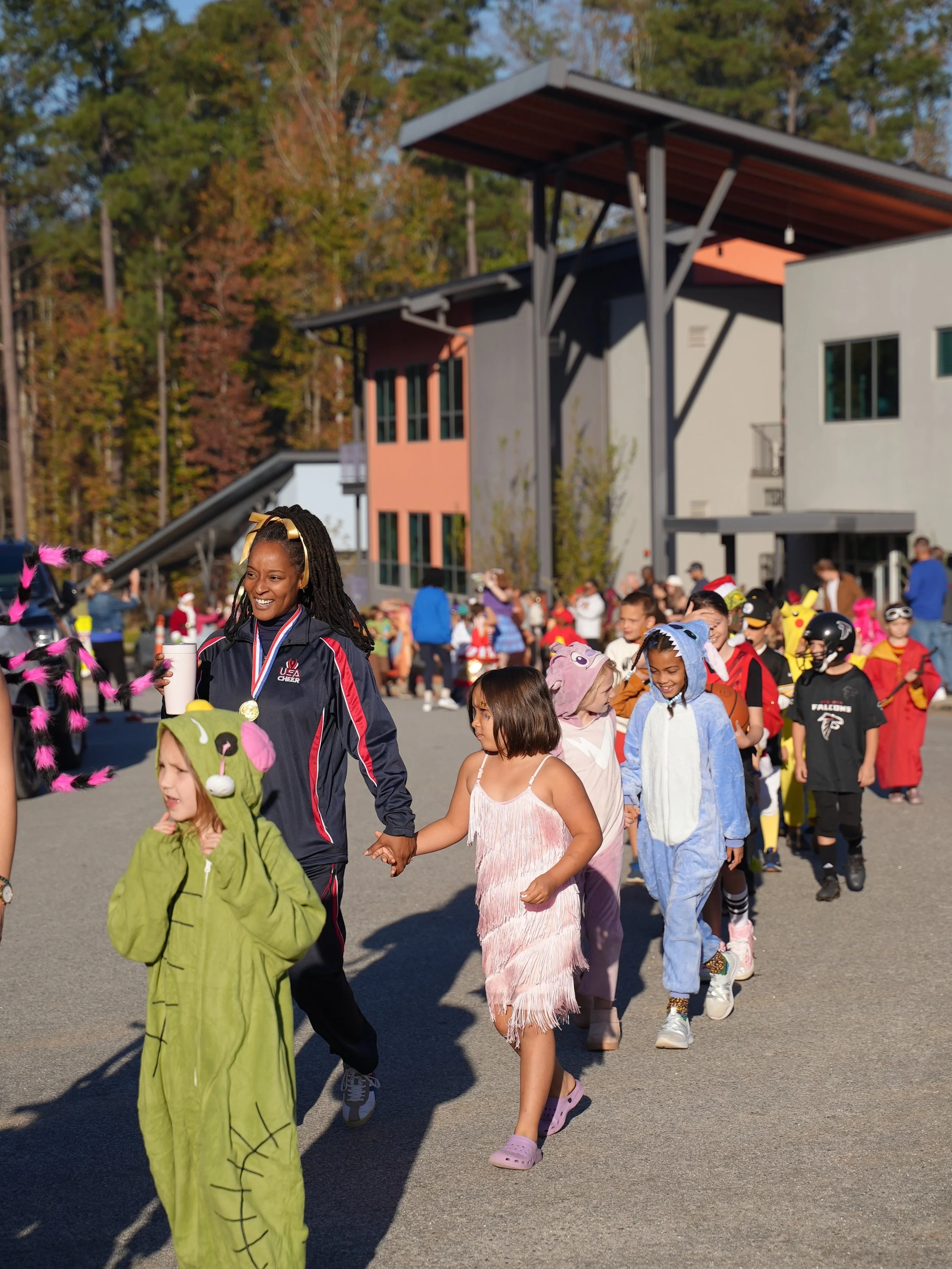 The Halloween parade is one of the most smile-filled events of the year. We loved how many community members came out to see our students make their way around the block! 

Cheers to a fun weekend for all our families!! 🎃