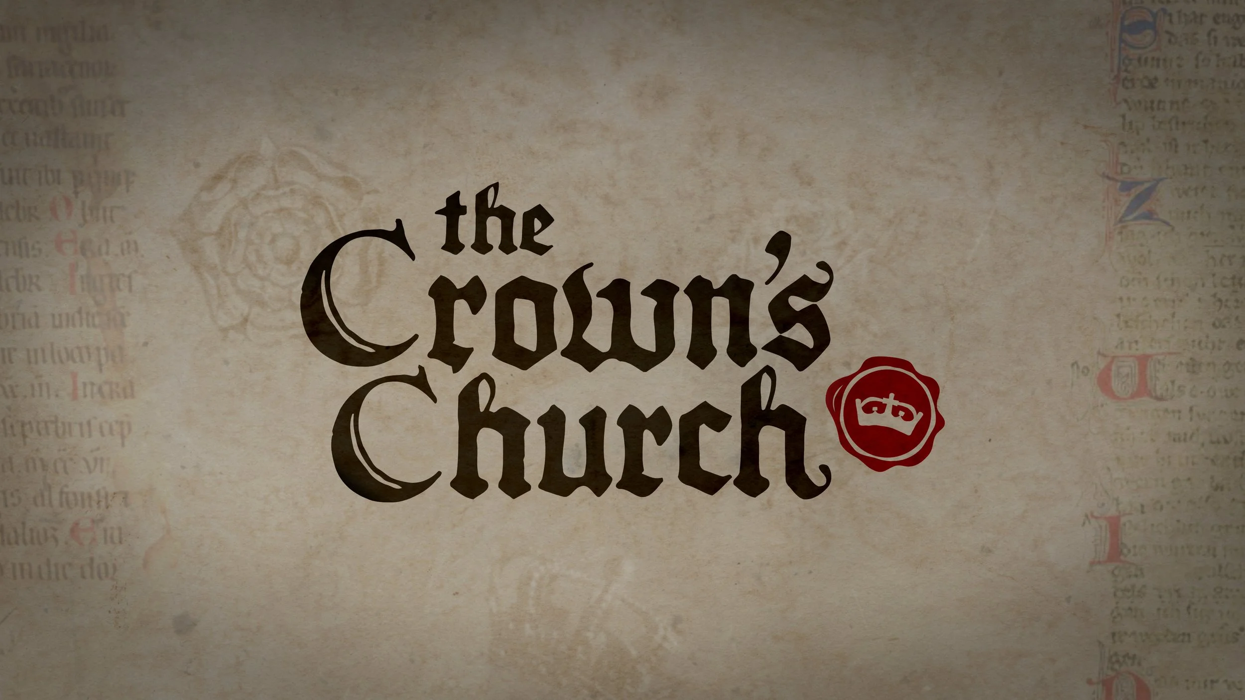 Night view of Tower Bridge in London, seen through a metal fence and a partially visible informational board.