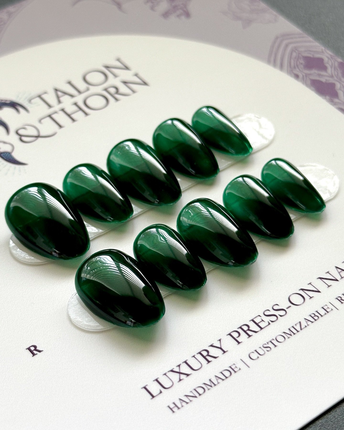 Channeling my inner forest goddess with these dark green nails 🌲✨ The perfect touch of mystery and elegance!

 #pressonnails #custompressonnails #nailart #nailtrends #gelnails #greennails